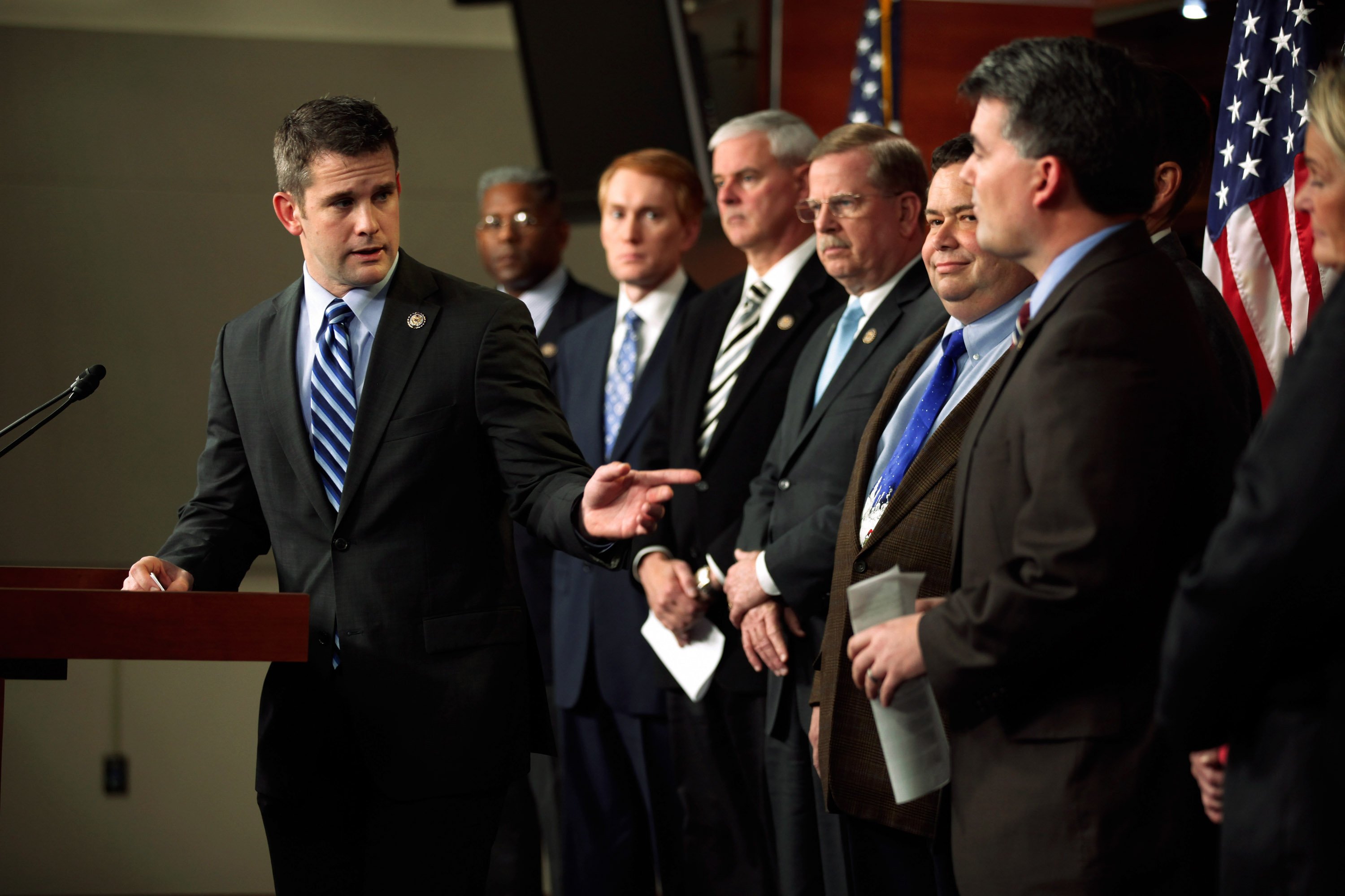 Rep. Adam Kinzinger (R-IL) (L) holds a news conference on the payroll tax vote with fellow House Republican freshmen at the U.S. Capitol December 19, 2011 in Washington, DC. (Photo by Chip Somodevilla/Getty Images)
