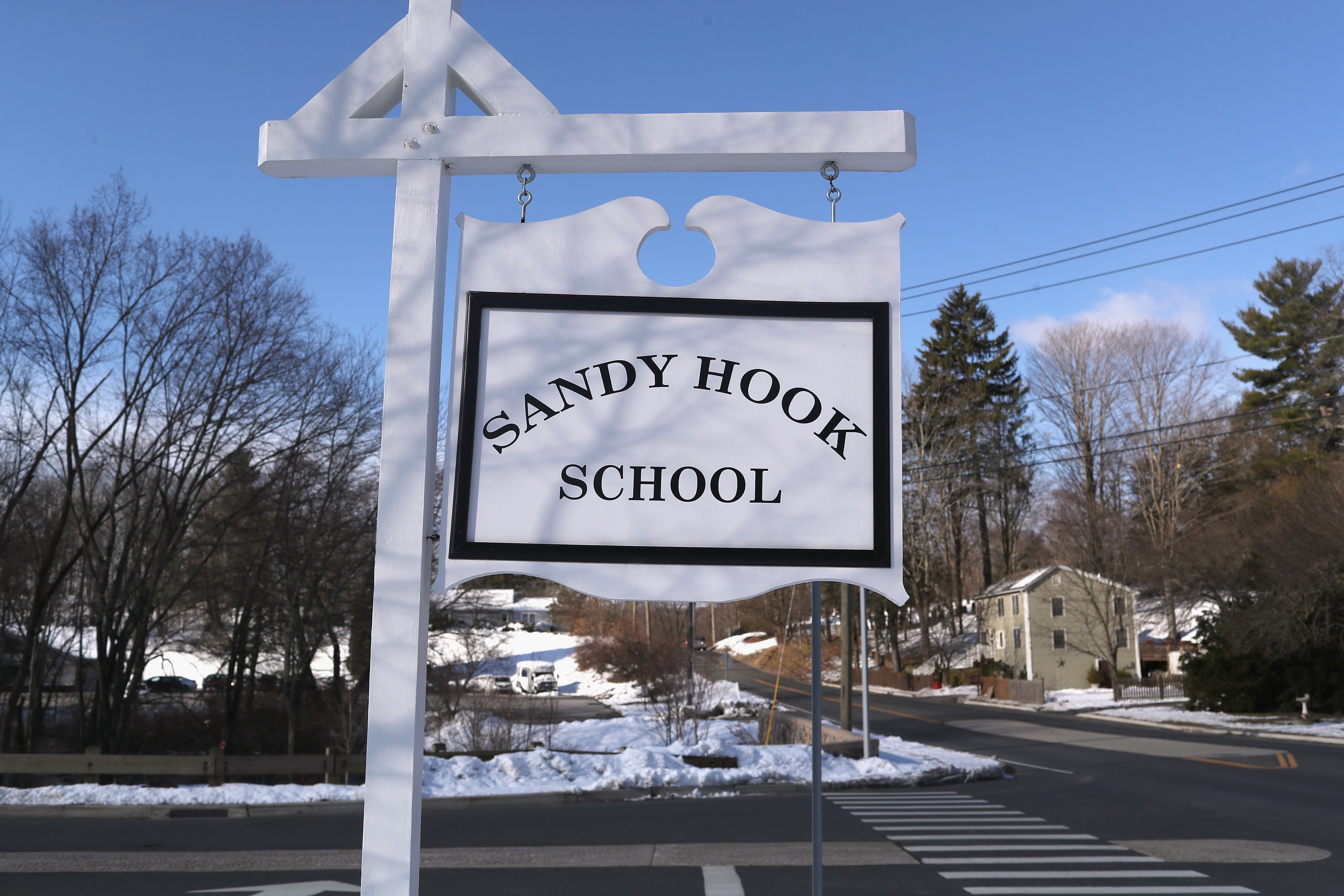 A sign stands near the site of the December 2012 Sandy Hook school shooting on the day of the National School Walkout on March 14, 2018 in Sandy Hook Connecticut. (Photo by John Moore/Getty Images)