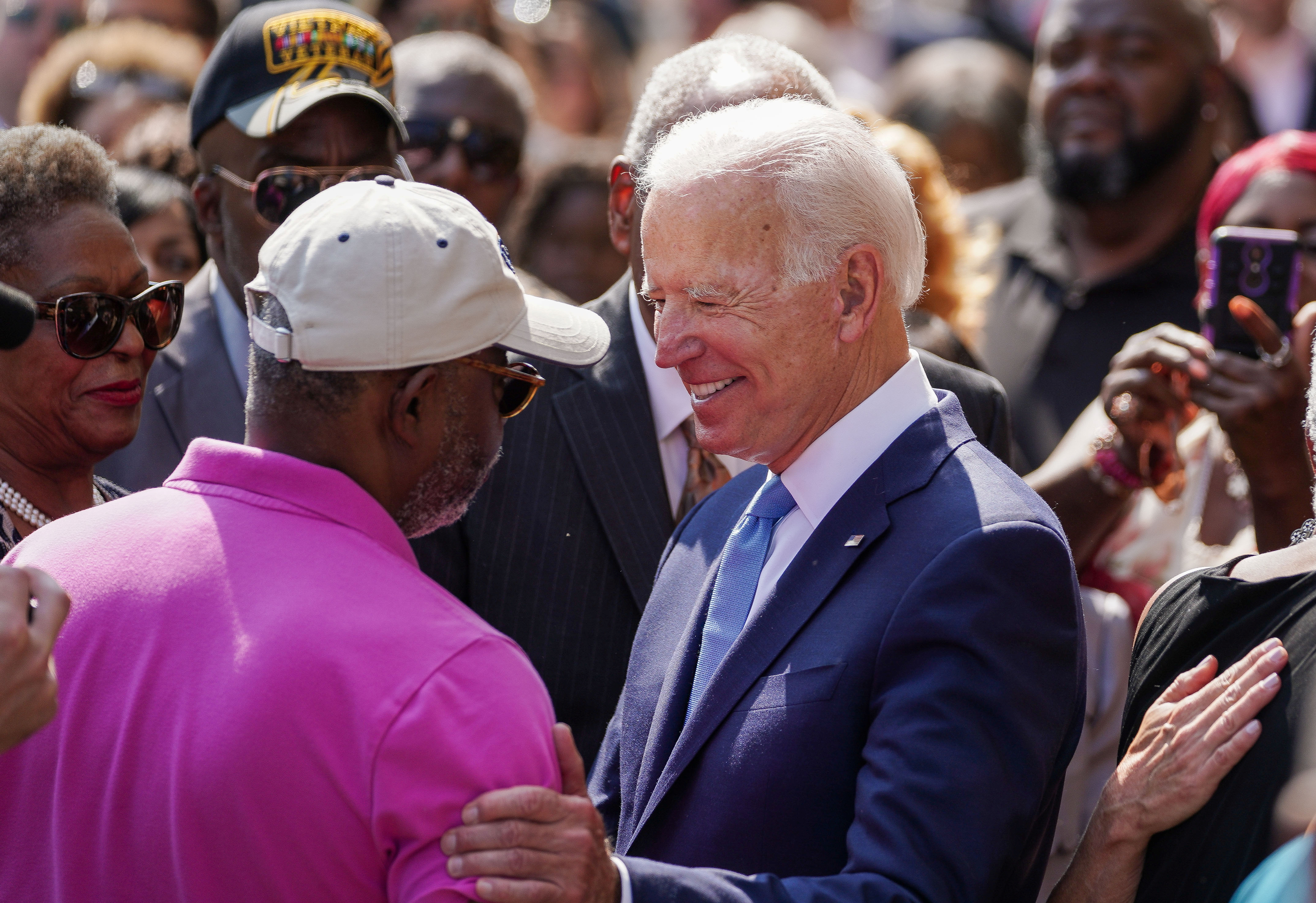 Democratic U.S. presidential candidate and former Vice President Joe Biden speaks with a man in the crowd at the "56th Memorial Observance of the Birmingham Church Bombing" at the 16th St. Baptist Church in Birmingham, Alabama, U.S. September 15, 2019. REUTERS/Marvin Gentry 