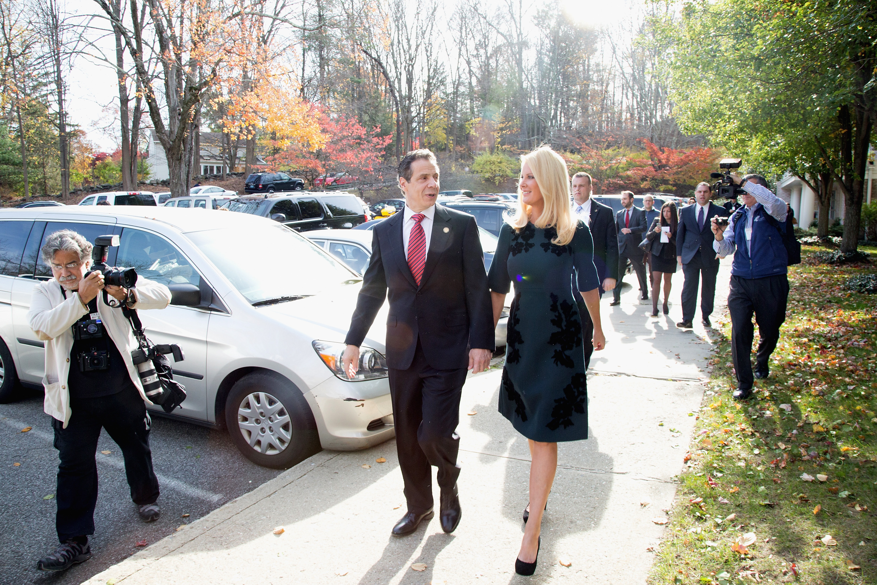 New York State Governor, Andrew Cuomo (L), and his girlfriend, television personality Sandra Lee, arrive to vote during the 2014 general election at the Presbyterian Church of Mount Kisco on November 4, 2014 in Mt Kisco, New York. (Photo by Kenneth Gabrielsen/Getty Images)