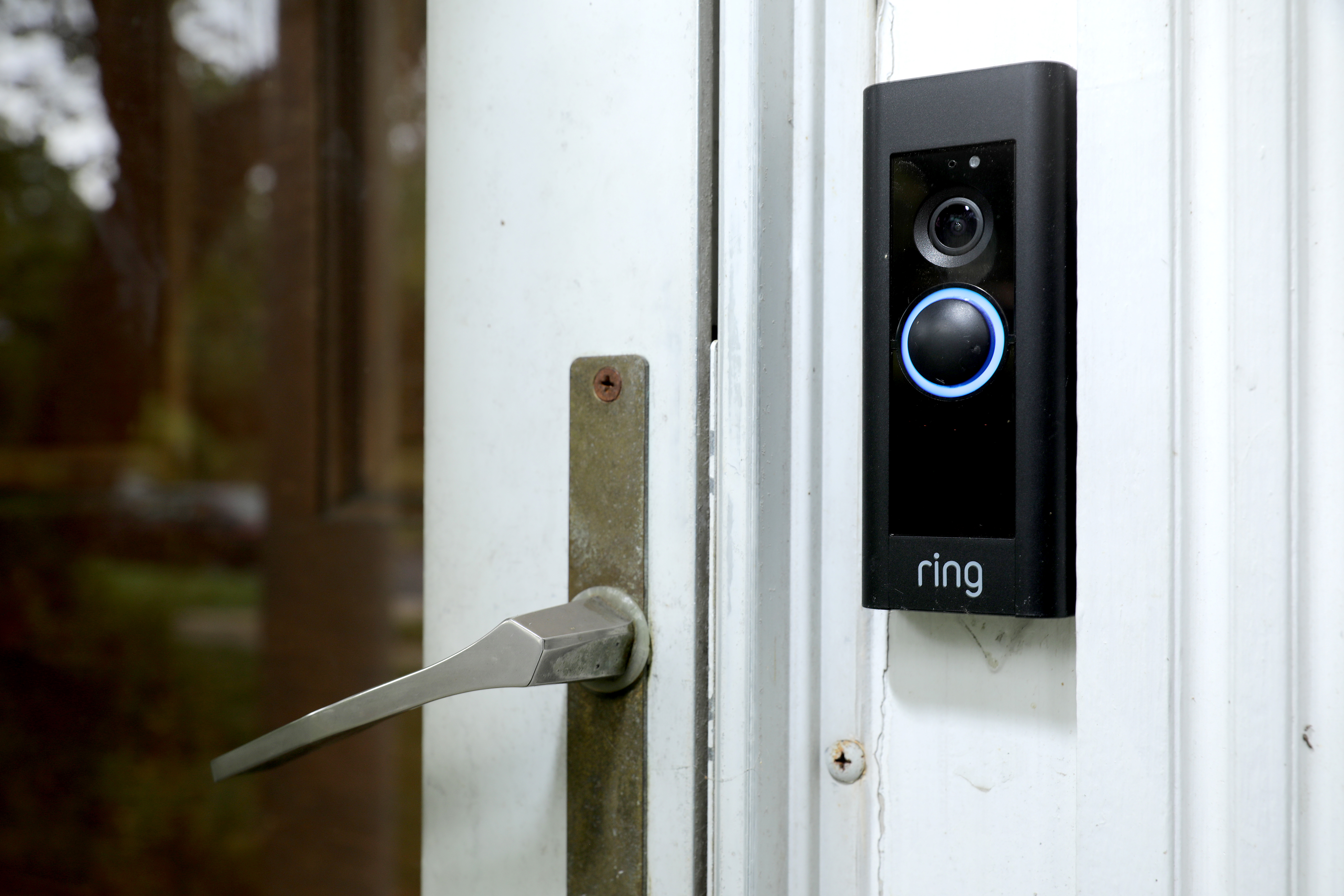 A doorbell device with a built-in camera made by home security company Ring is seen on August 28, 2019 in Silver Spring, Maryland. These devices allow users to see video footage of who is at their front door when the bell is pressed or when motion activates the camera. According to reports, Ring has made video-sharing partnerships with more than 400 police forces across the United States, granting them access to camera footage with the homeowners’ permission in what the company calls the nation’s 'new neighborhood watch.' (Photo by Chip Somodevilla/Getty Images)