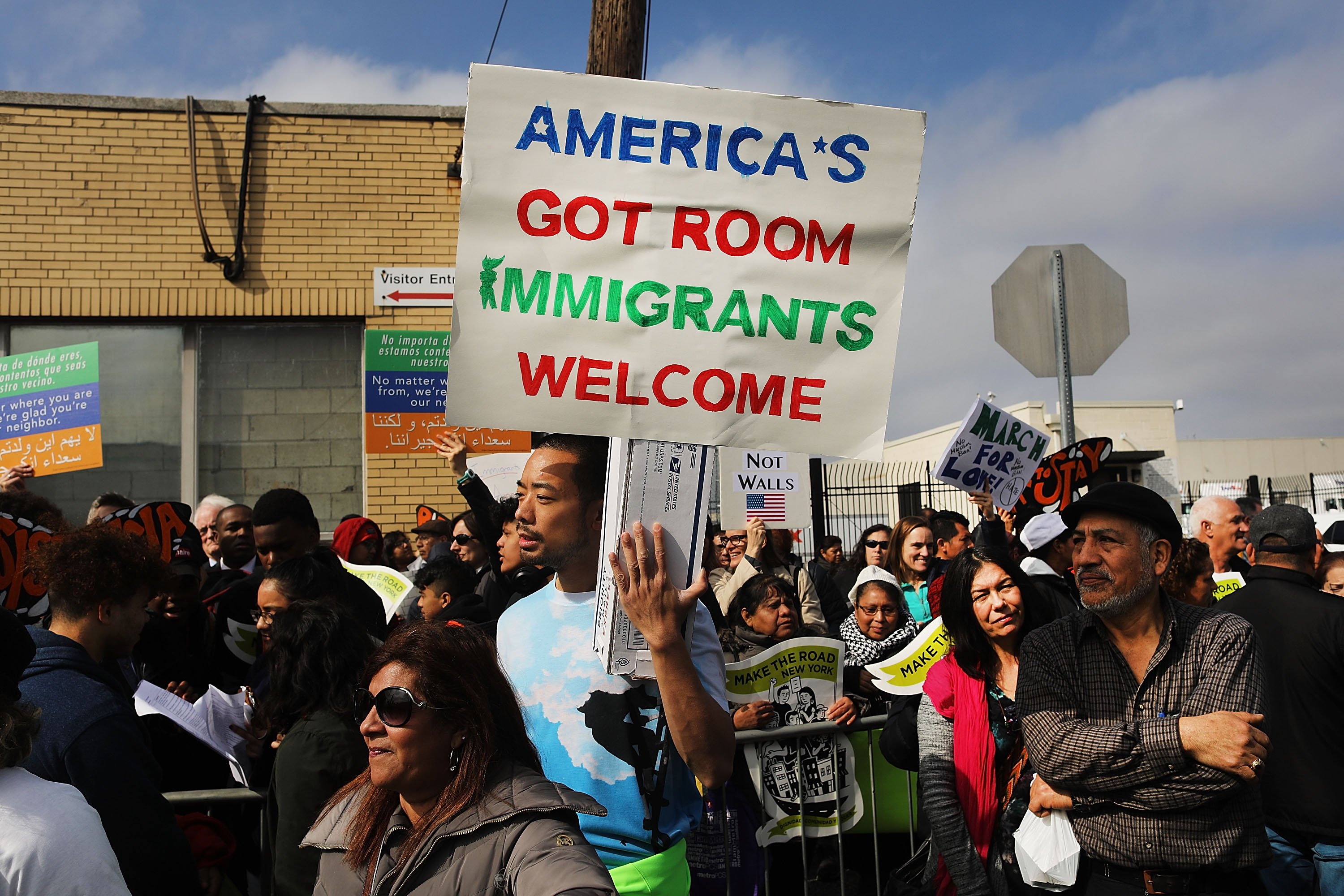 People protest outside of the Elizabeth Detention Center during a rally attended by immigrant residents and activists on February 23, 2017 in Elizabeth, New Jersey. Over 100 demonstrators chanted and held up signs outside of the center which is currently holding people awaiting deportation. The demonstrators, five of whom were arrested, denounced President Donald Trump and his deportation policies. Around the country stories of Immigration and Customs Enforcement (ICE) raids have sent fear through immigrant communities. (Photo by Spencer Platt/Getty Images)