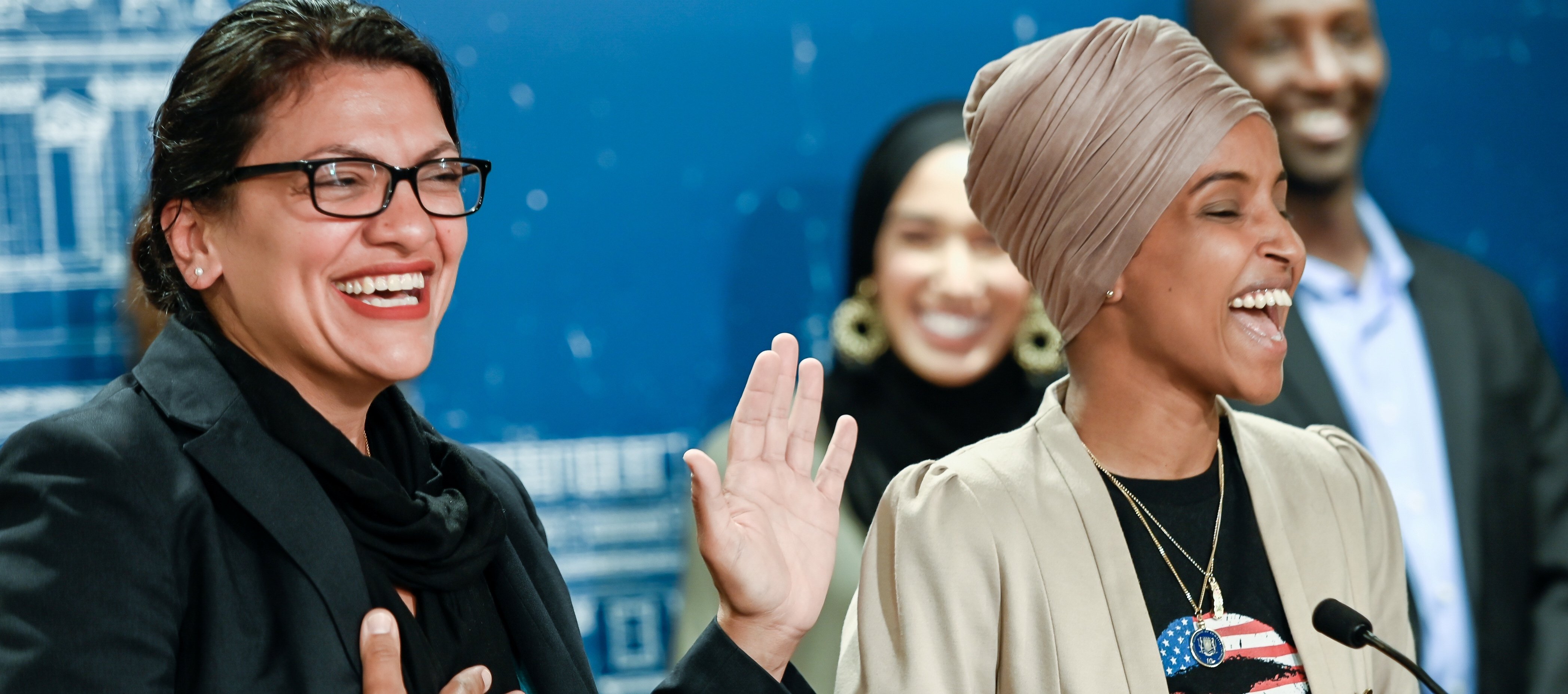 U.S. Representatives Rashida Tlaib (D-MI) and Ilhan Omar (D-MN) react as they discuss travel restrictions to Palestine and Israel during a news conference at the Minnesota State Capitol Building in St Paul, Minnesota, August 19, 2019. REUTERS/Caroline Yang