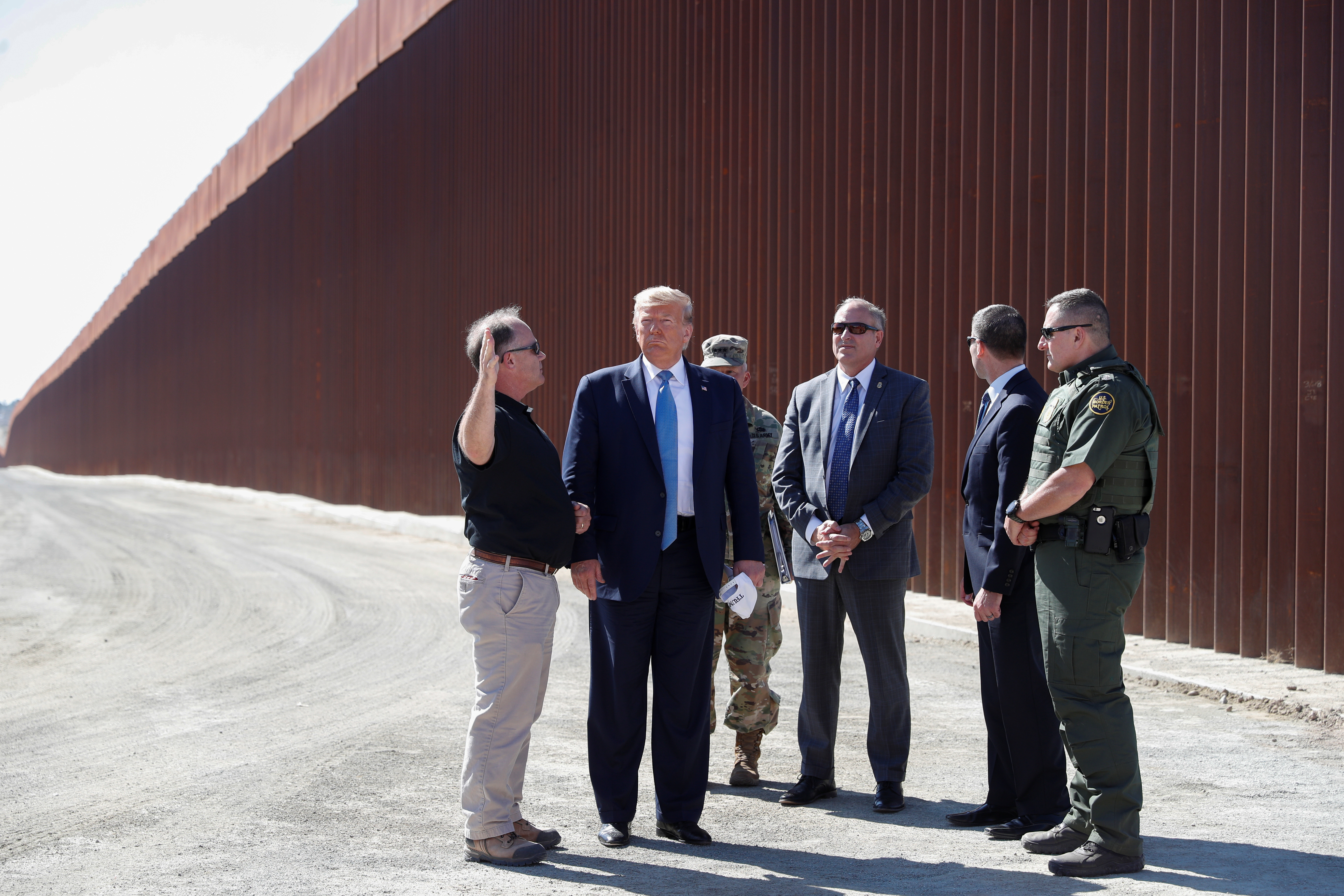 U.S. President Donald Trump visits a section of the U.S.-Mexico border wall in Otay Mesa