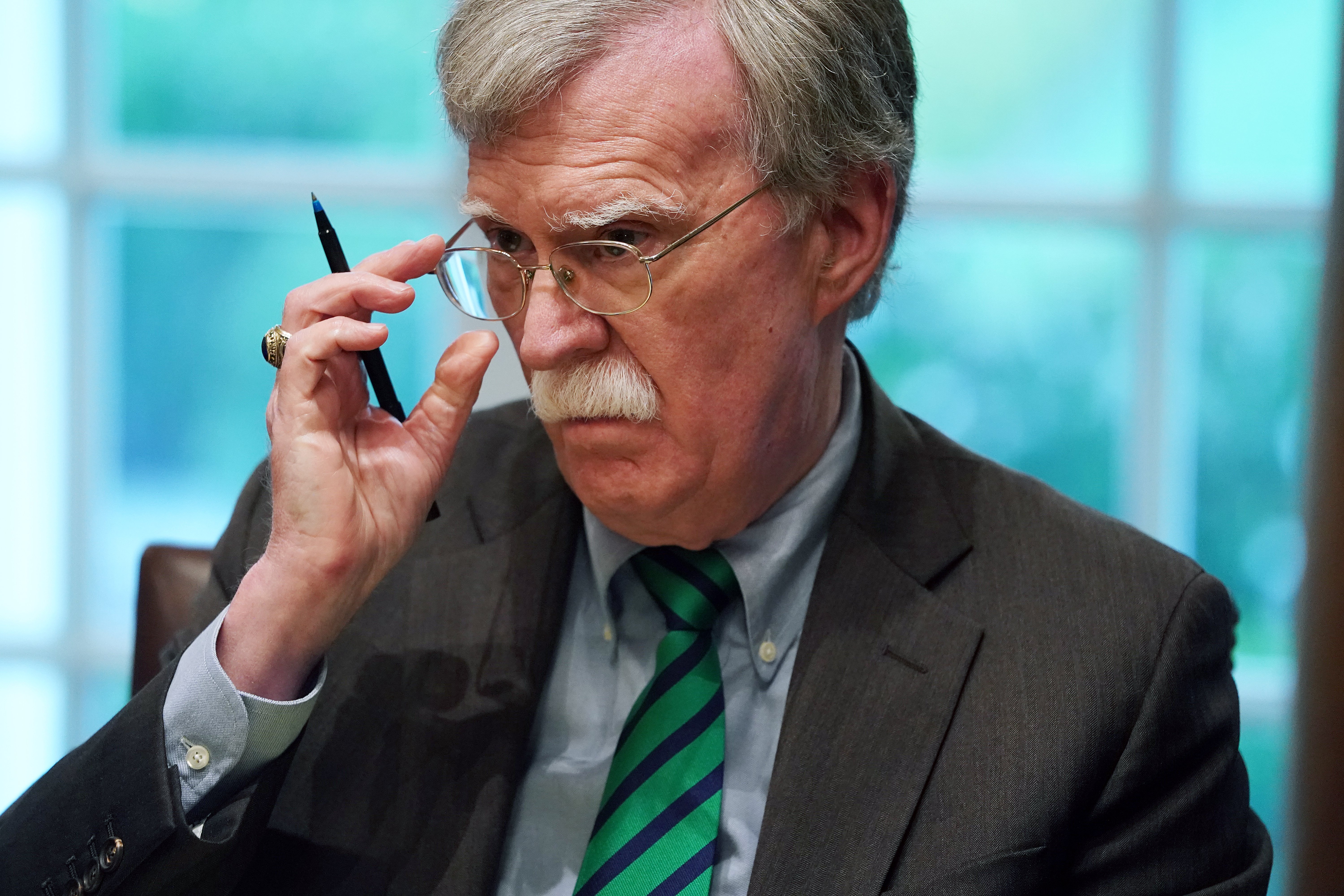 U.S. National Security Advisor John Bolton joins President Donald Trump and NATO Secretary General Jens Stoltenberg during a bilateral meeting in the Cabinet Room at the White House April 02, 2019 in Washington, DC. (Chip Somodevilla/Getty Images)