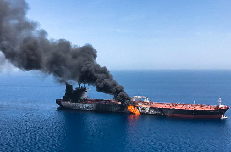 A picture obtained by AFP from Iranian News Agency ISNA on June 13, 2019 reportedly shows fire and smoke billowing from Norwegian owned Front Altair tanker said to have been attacked in the waters of the Gulf of Oman. (AFP/Getty Images)