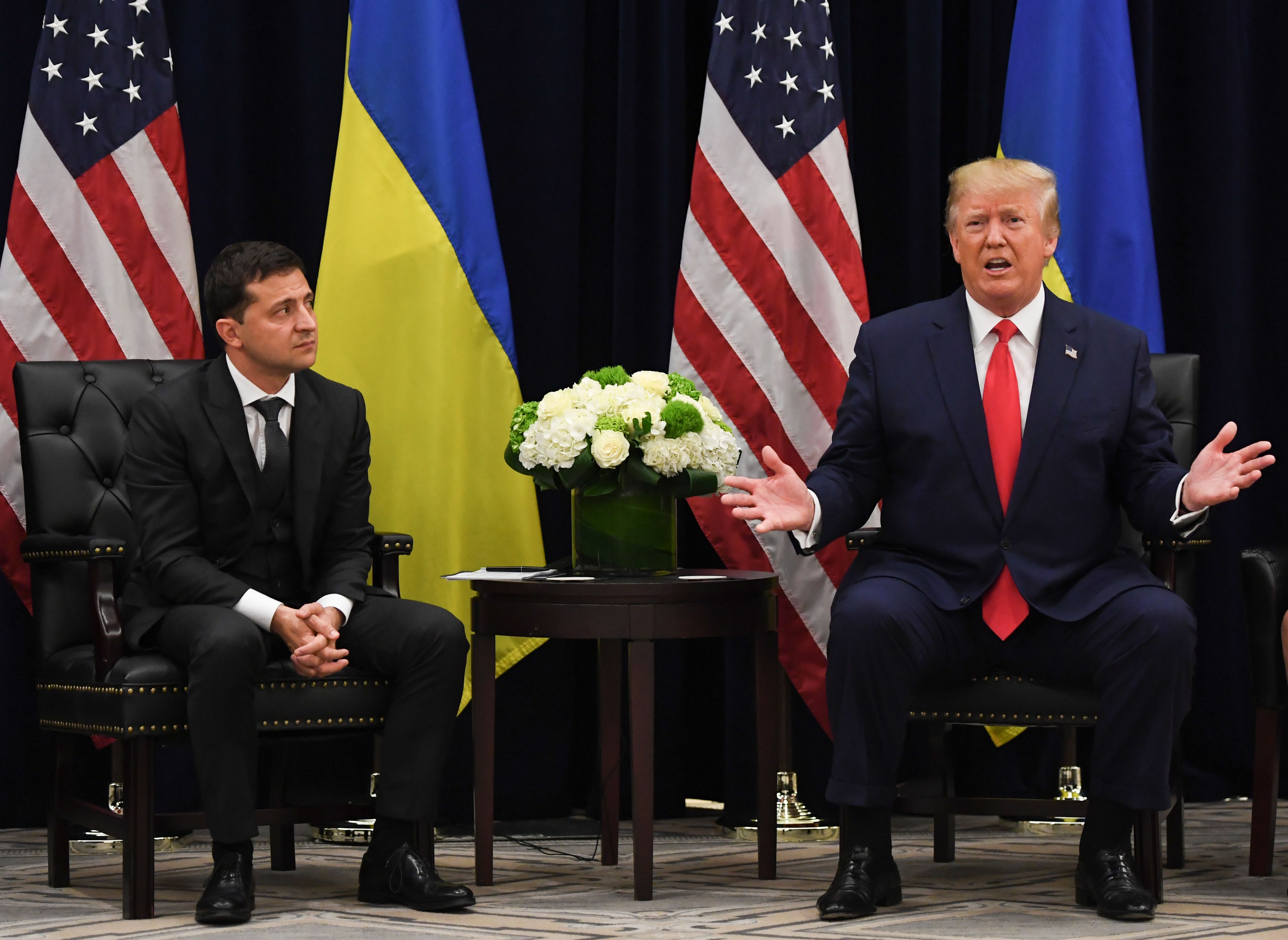 U.S. President Donald Trump speaks as Ukrainian President Volodymyr Zelensky looks on during a meeting in New York on Sept. 25, 2019, on the sidelines of the United Nations General Assembly. (Photo by SAUL LOEB/AFP/Getty Images)