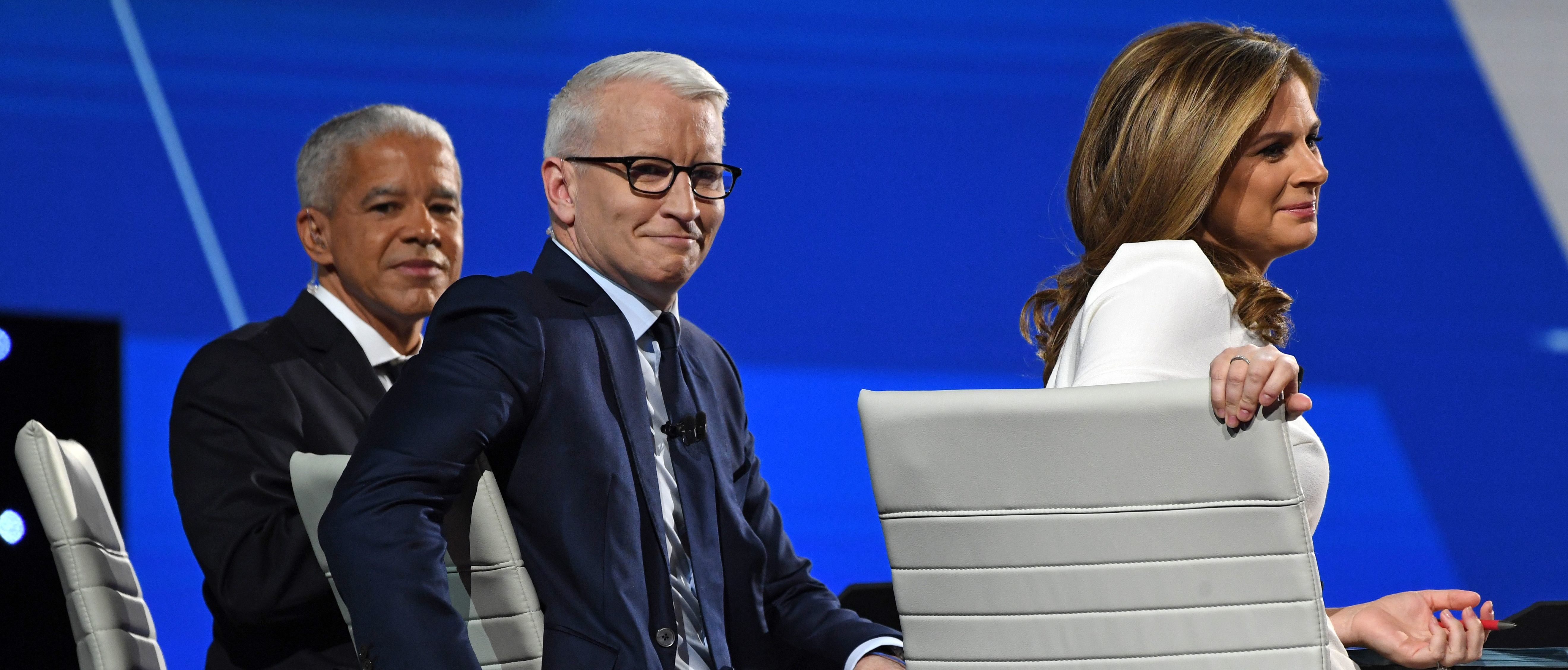 Moderator and The New York Times national editor Marc Lacey (L), moderator and CNN anchor Anderson Cooper (C) and moderator and CNN anchor Erin Burnett are pictured on stage ahead of the fourth Democratic primary debate of the 2020 presidential campaign season co-hosted by The New York Times and CNN at Otterbein University in Westerville, Ohio on October 15, 2019. (Photo by SAUL LOEB / AFP) (Photo by SAUL LOEB/AFP via Getty Images)