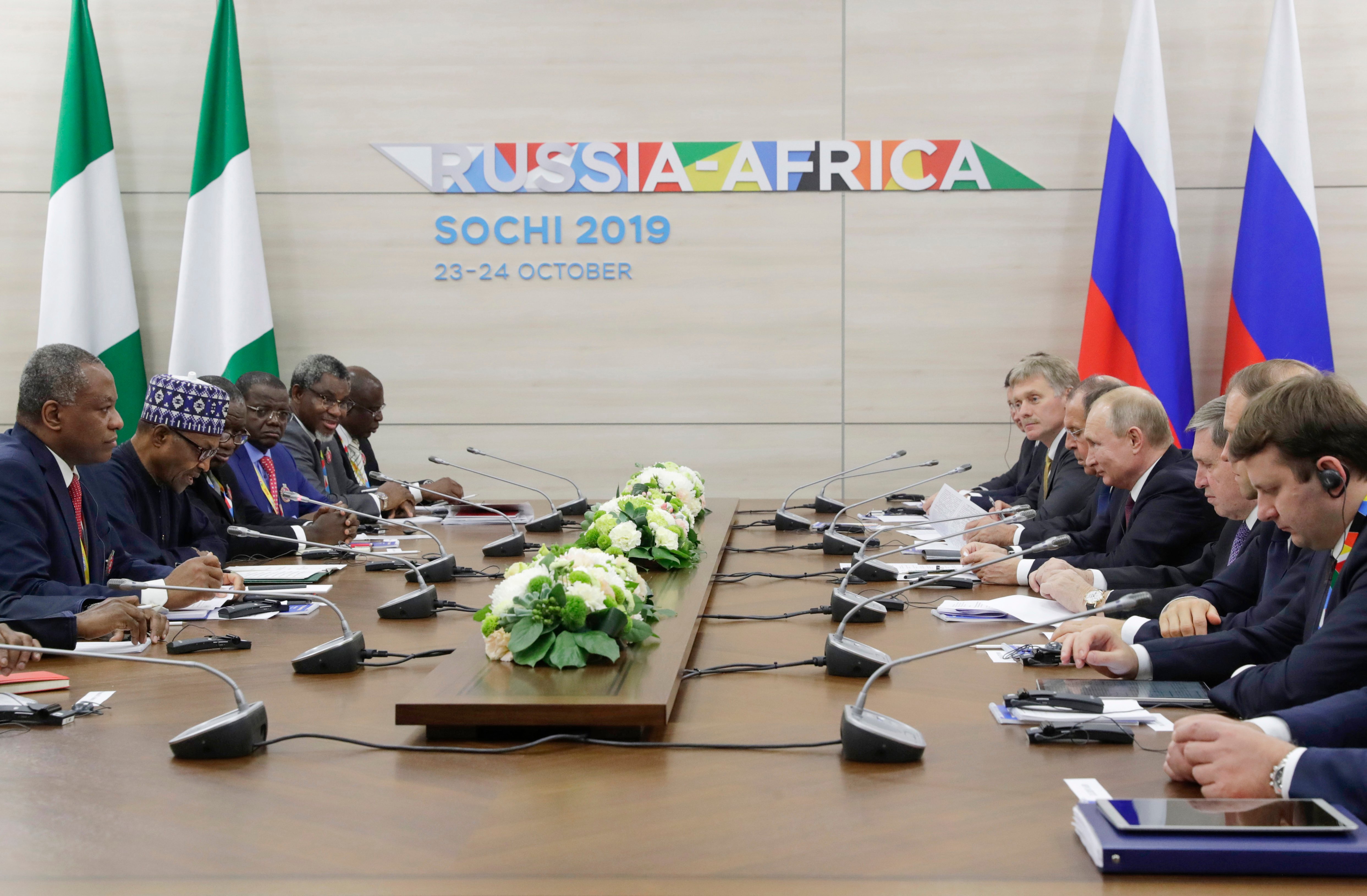 Russian President Vladimir Putin (4R) meets with Nigeria's President Muhammadu Buhari (2L) on the sidelines of the 2019 Russia-Africa Summit in Sochi on October 23, 2019. (Photo by MIKHAIL METZEL/SPUTNIK/AFP via Getty Images)
