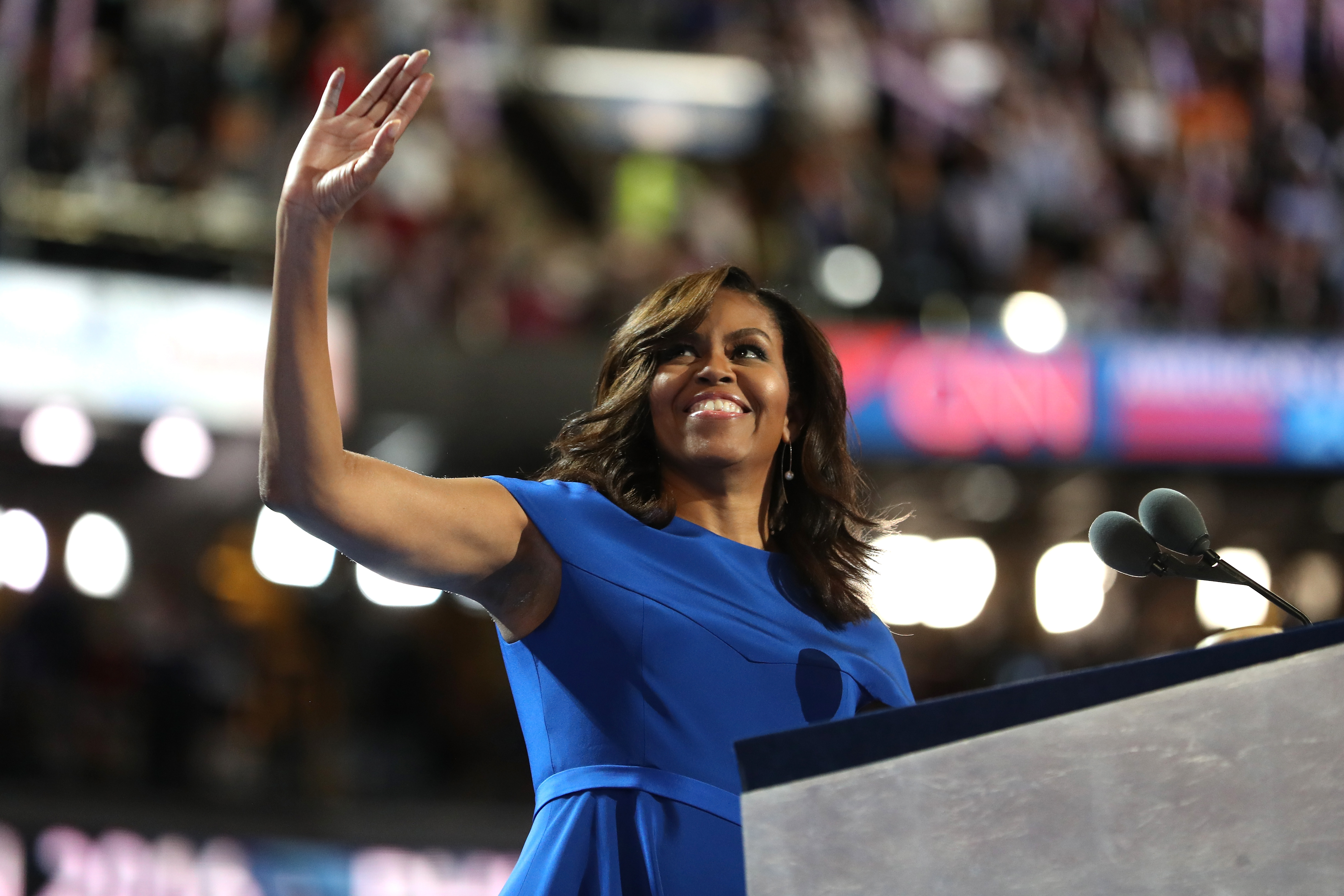 First lady Michelle Obama acknowledges the crowd after delivering remarks on the first day of the Democratic National Convention at the Wells Fargo Center, July 25, 2016 in Philadelphia, Pennsylvania. (Photo by Joe Raedle/Getty Images)