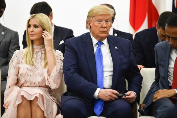 US President Donald Trump (C) and advisor to the President Ivanka Trump (L) attend an event on women's empowerment during the G20 Summit in Osaka on June 29, 2019. (Photo credit: BRENDAN SMIALOWSKI/AFP/Getty Images)