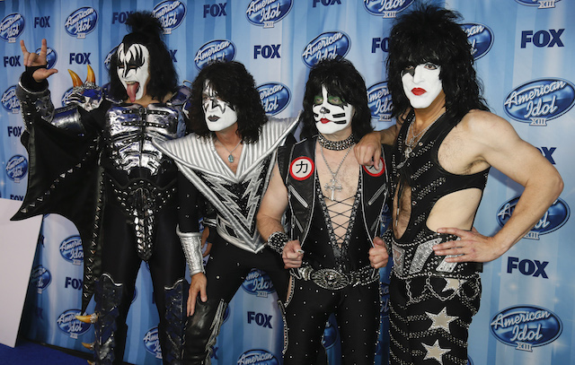 The band Kiss poses backstage at the American Idol XIII 2014 Finale in Los Angeles, California May 21, 2014. REUTERS/Danny Moloshok 