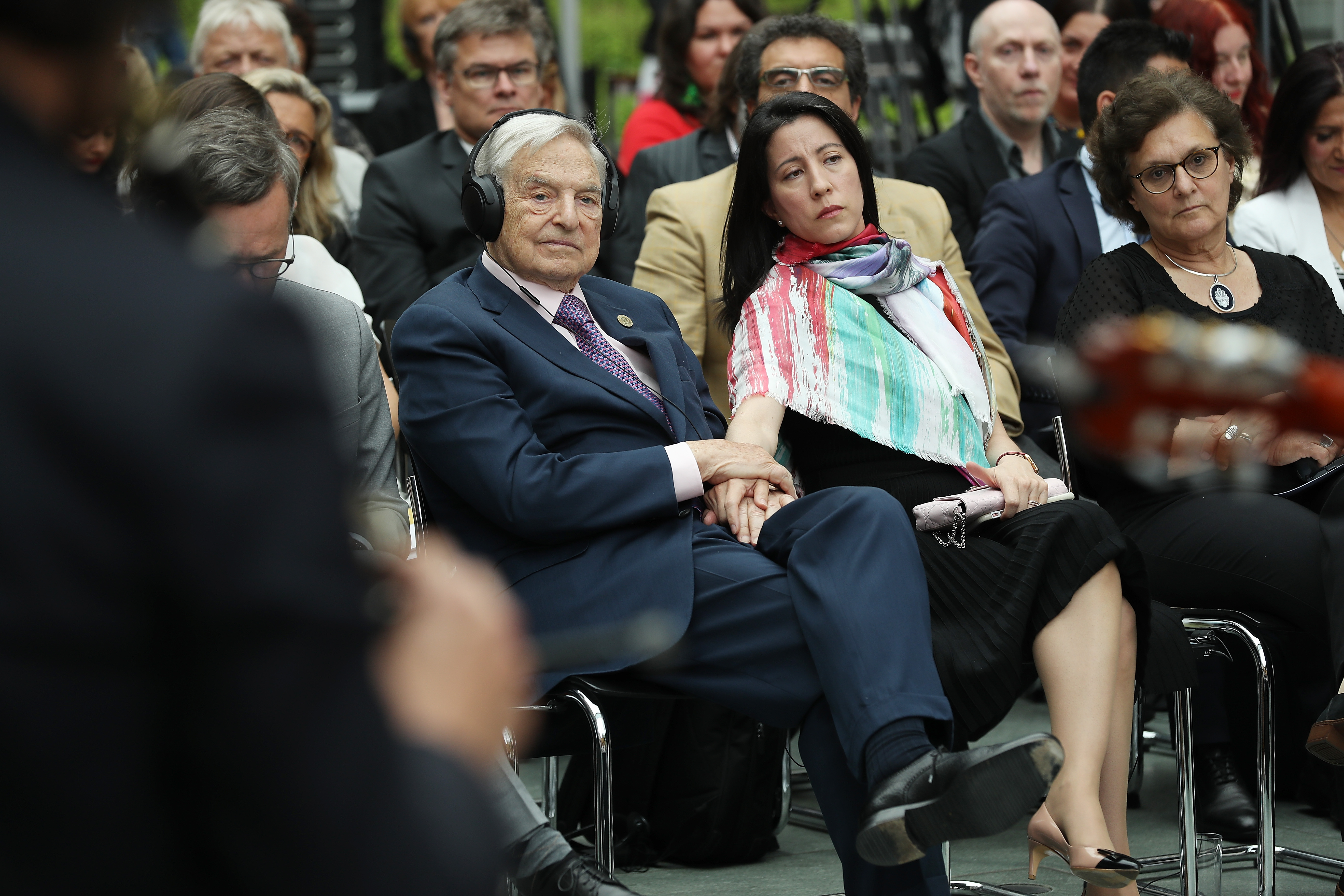 BERLIN, GERMANY - JUNE 08: Financier and philanthropist George Soros and his wife Tamiko Bolton attend the official opening of the European Roma Institute for Arts and Culture (ERIAC) at the German Foreign Ministry on June 8, 2017 in Berlin, Germany. The Institute, which is an initiative of the European Council, the Open Society Fund and the Alliance for the European Roma Institute for Arts and Culture, will have an administrative office in Berlin, gallery space in Venice and a liaison office in Brussels. (Photo by Sean Gallup/Getty Images)