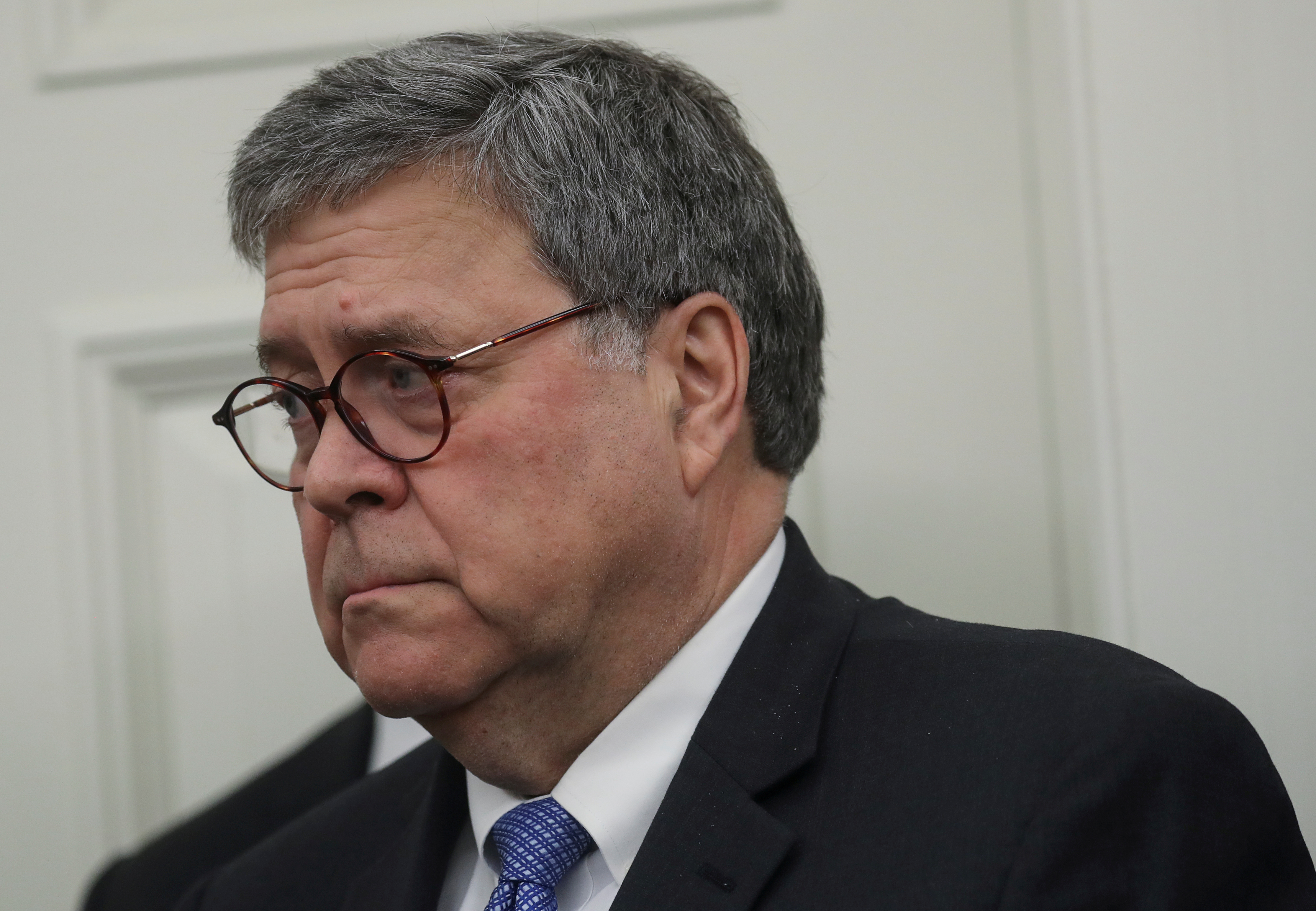 FILE PHOTO: U.S. Attorney General William Barr attends a Presidential Medal of Freedom ceremony in honor of former Attorney General Edwin Meese in the Oval Office of the White House in Washington, October 8, 2019. REUTERS/Leah Millis/File Photo 