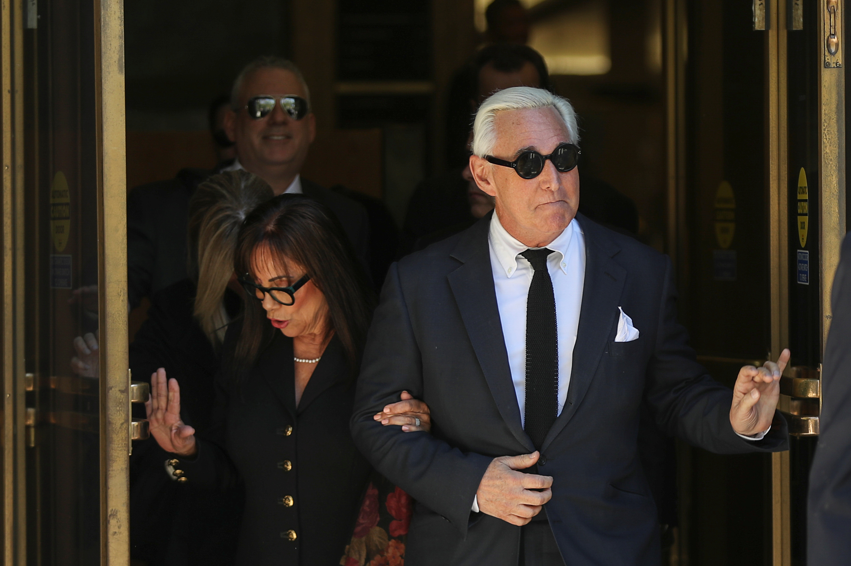Roger Stone, former campaign adviser to U.S. President Donald Trump, is accompanied by his wife Nydia as he departs following a pre-trial hearing at U.S. District Court in Washington, U.S., November 4, 2019. REUTERS/Siphiwe Sibeko 