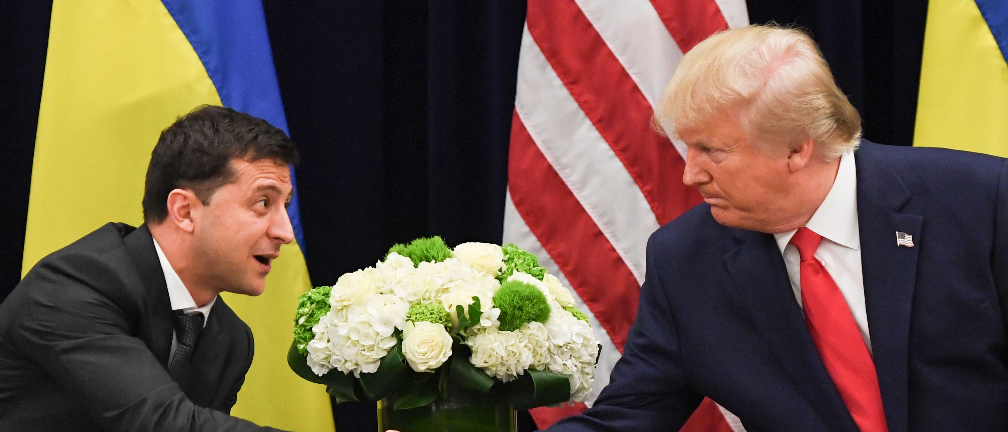 U.S. President Donald Trump and Ukrainian President Volodymyr Zelensky shake hands during a meeting in New York on Sept. 25, 2019. (SAUL LOEB/AFP via Getty Images)