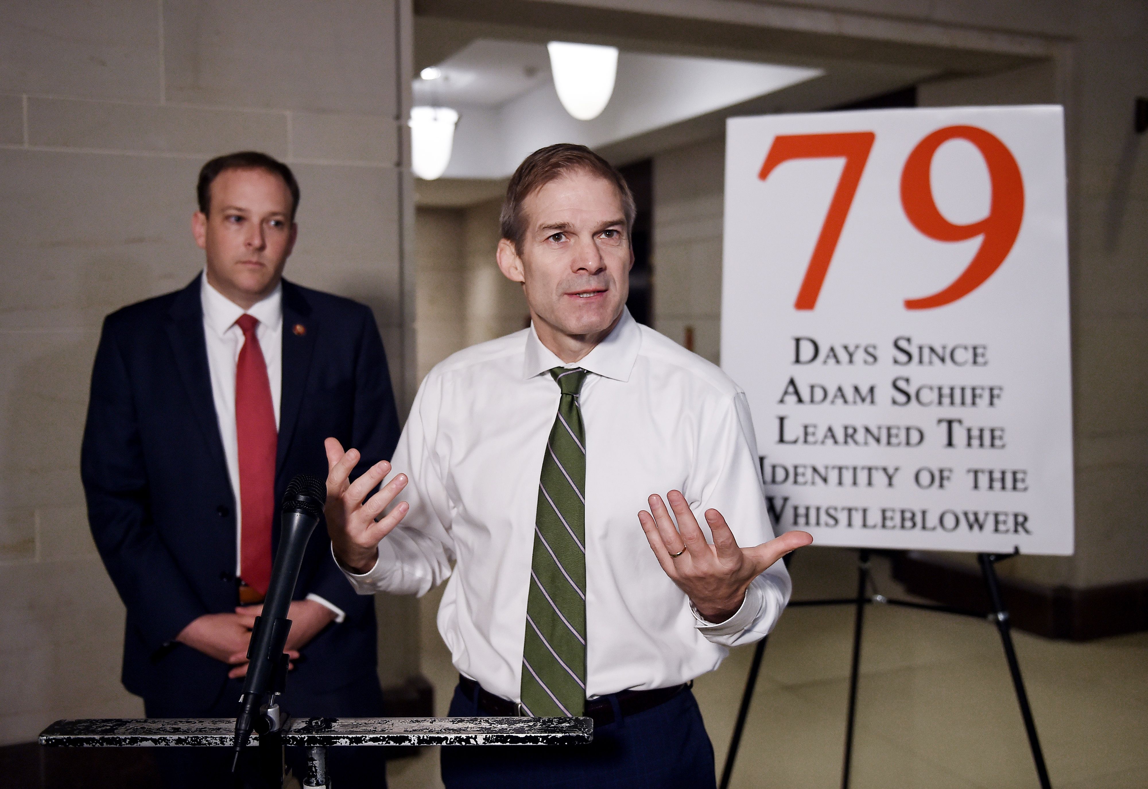 US Representative Jim Jordan (R-OH) speaks to the media as Representative Lee Zeldin (R-NY) looks on outside of the Sensitive Compartmented Information Facility (SCIF) at the US Capitol in Washington, DC on October 30, 2019. (OLIVIER DOULIERY/AFP via Getty Images)