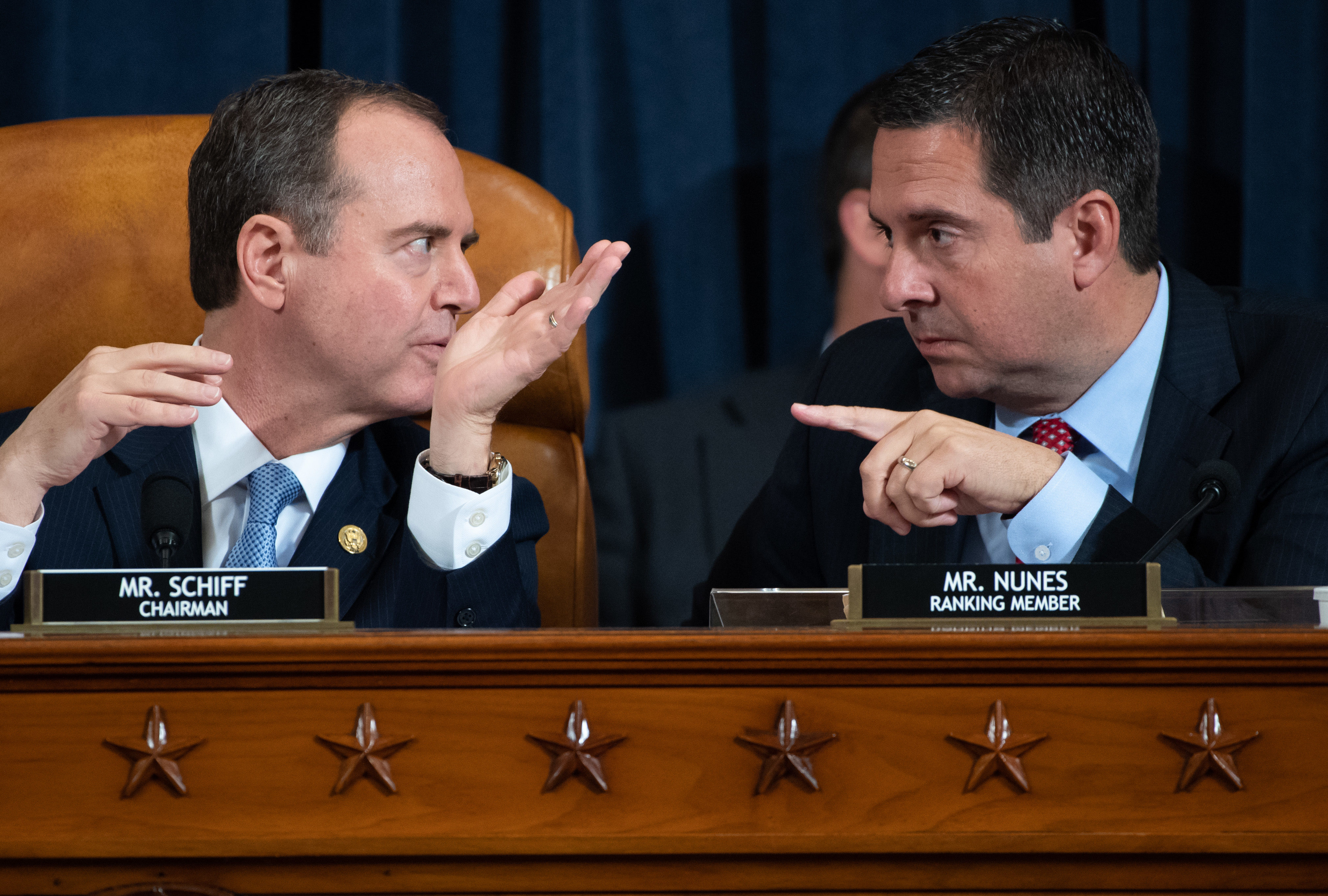 Chairman Adam Schiff (L), Democrat of California, and Ranking Member Devin Nunes (R), Republican of California, during the first public hearings held by the House Permanent Select Committee on Intelligence as part of the impeachment inquiry into US President Donald Trump. (SAUL LOEB/POOL/AFP via Getty Images)