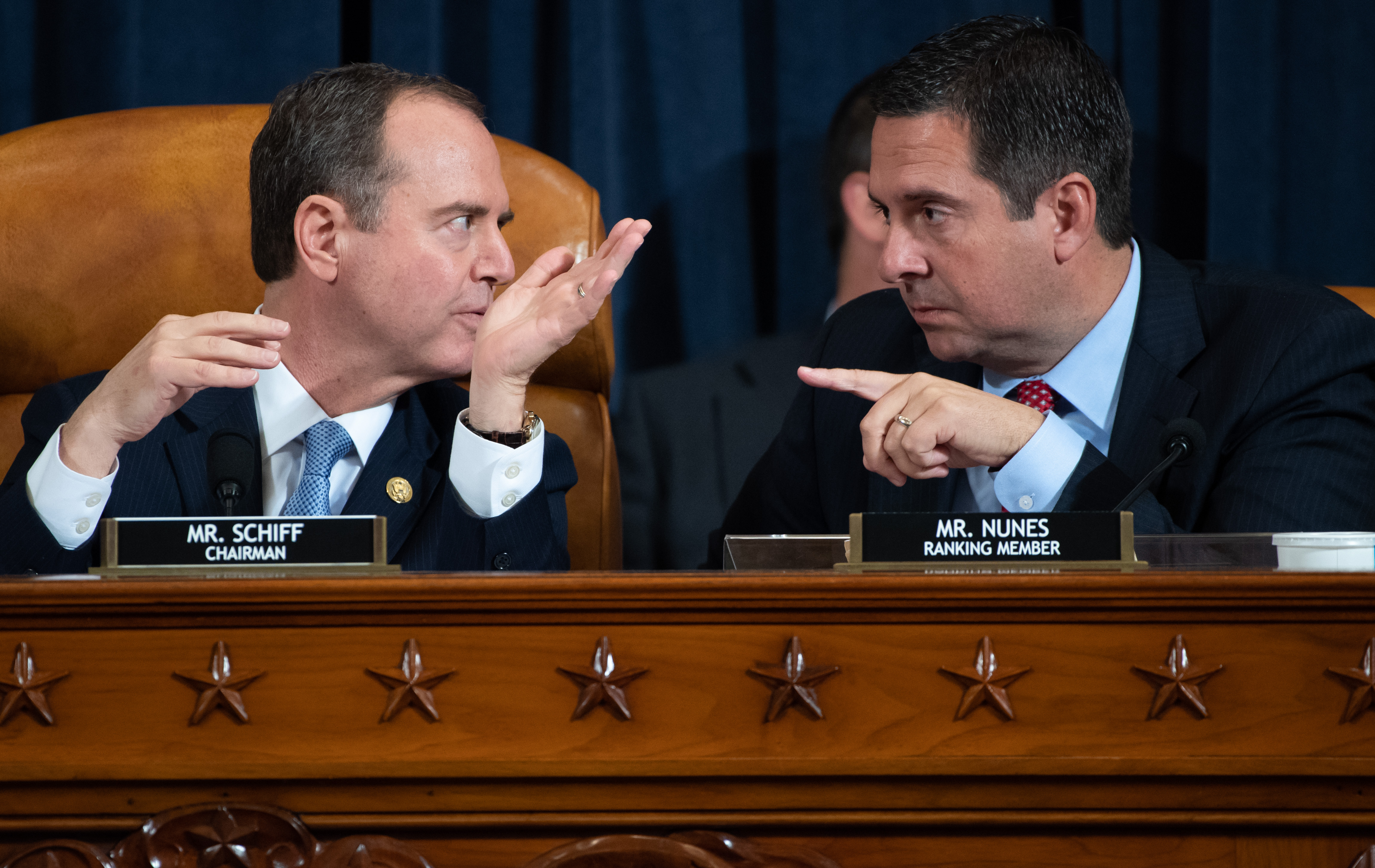 Chairman Adam Schiff (L), Democrat of California, and Ranking Member Devin Nunes (R), Republican of California, during the first public hearings held by the House Permanent Select Committee on Intelligence as part of the impeachment inquiry into US President Donald Trump. (SAUL LOEB/POOL/AFP via Getty Images)