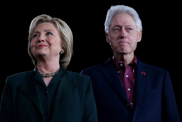 Former Secretary of State Hillary Clinton and her husband, former U.S. president Bill Clinton. (Justin Sullivan/Getty Images)