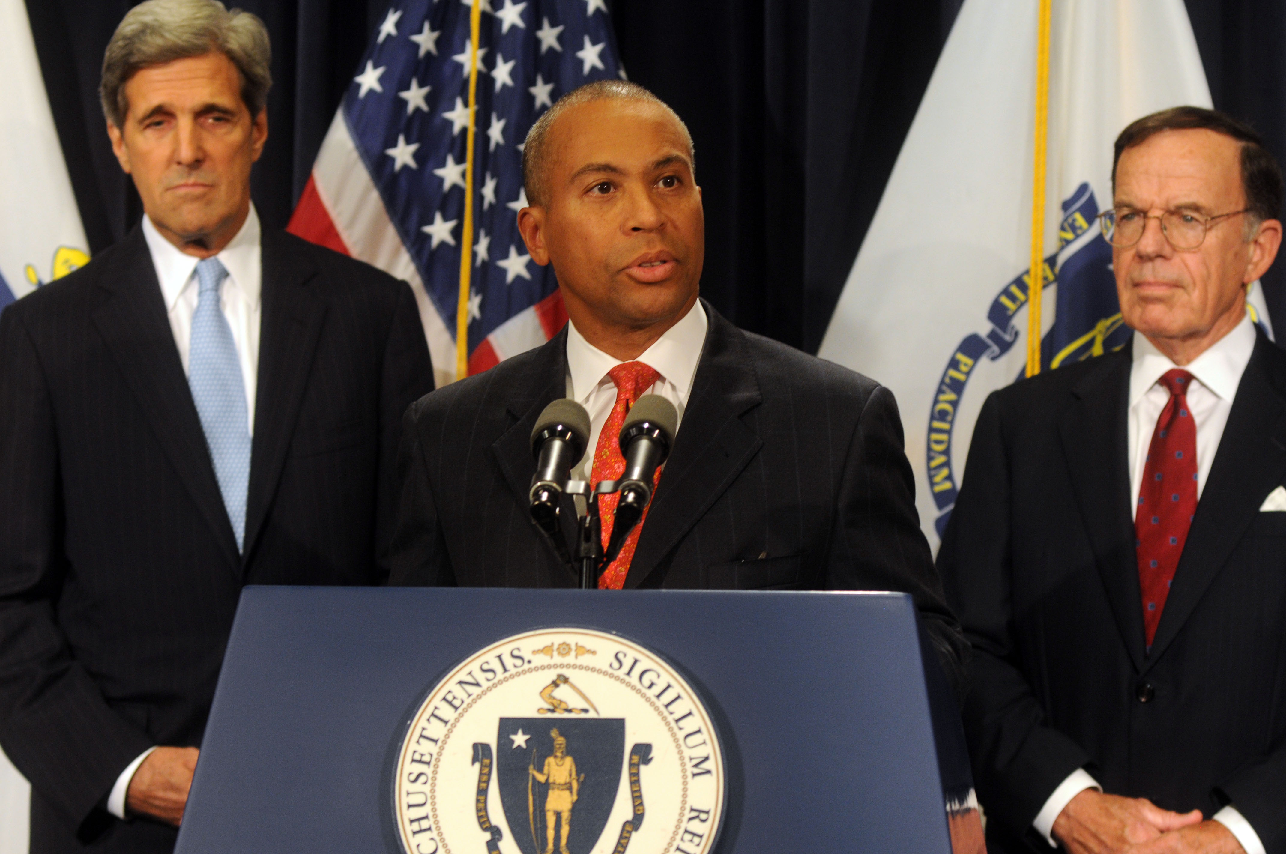 BOSTON, MA - SEPTEMBER 24: Massachusetts Democratic Governor Deval Patrick (C) speaks as U.S. Senator John Kerry (D-MA) (L) and Interim Senator Paul G. Kirk Jr. (D-MA) look on at a press conference on September 24, 2009 at the Statehouse in Boston, Massachusetts. Kirk, the former Democratic National Committee (DNC) chairman, will take over Sen. Edward M. Kennedy's seat that was left vacated from his passing on August 25. (Photo by Darren McCollester/Getty Images)