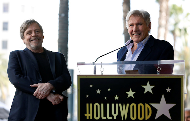 Actor Harrison Ford speaks next to actor Mark Hamill before unveiling his star on the Hollywood Walk of Fame in Los Angeles, California, U.S., March 8, 2018. REUTERS/Mario Anzuoni 