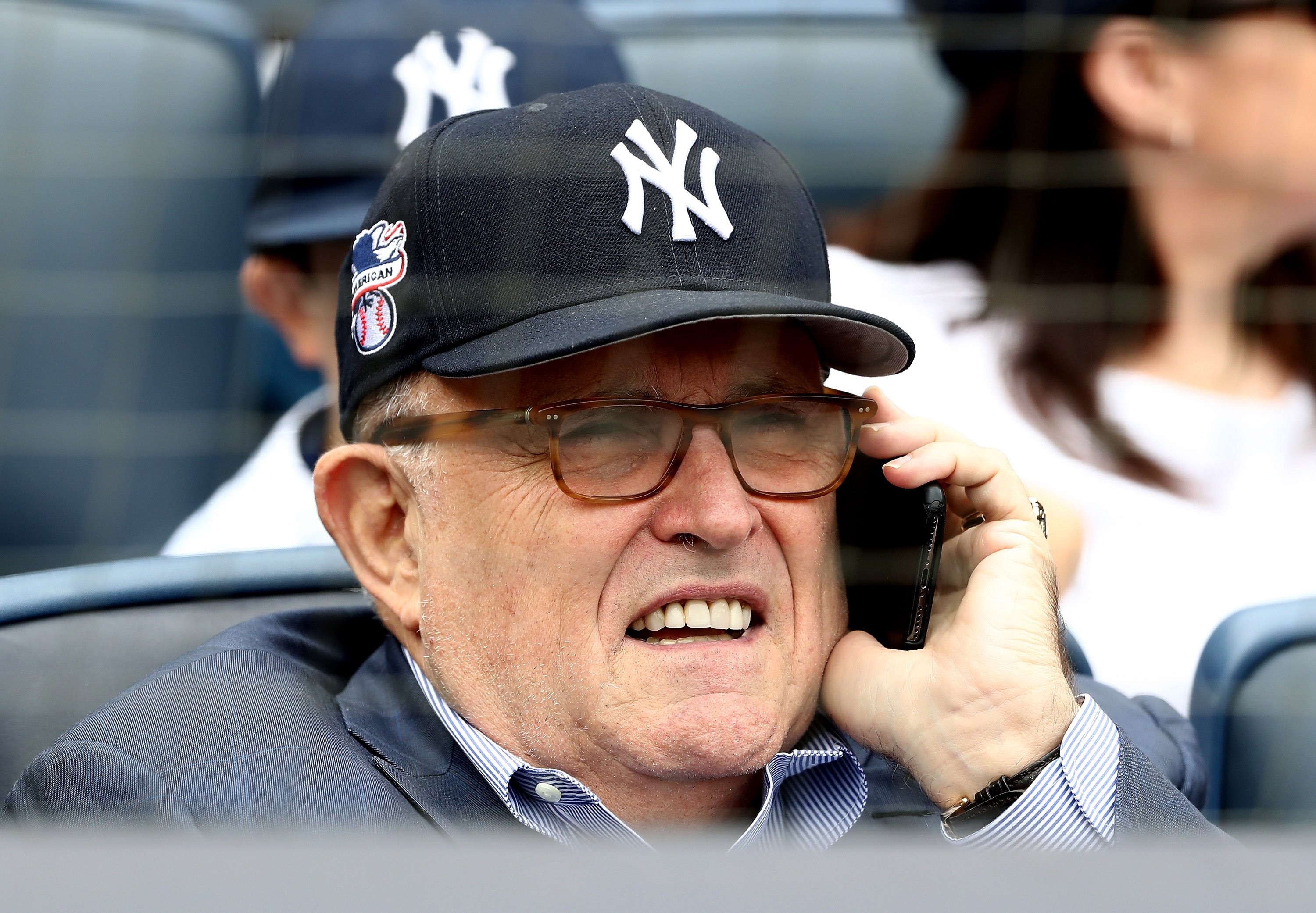 Rudy Giuliani, former New York City mayor and current lawyer for President Donald Trump, attends the game between the New York Yankees and the Houston Astros at Yankee Stadium on May 28, 2018 in the Bronx borough of New York City. MLB players across the league are wearing special uniforms to commemorate Memorial Day. (Photo by Elsa/Getty Images)