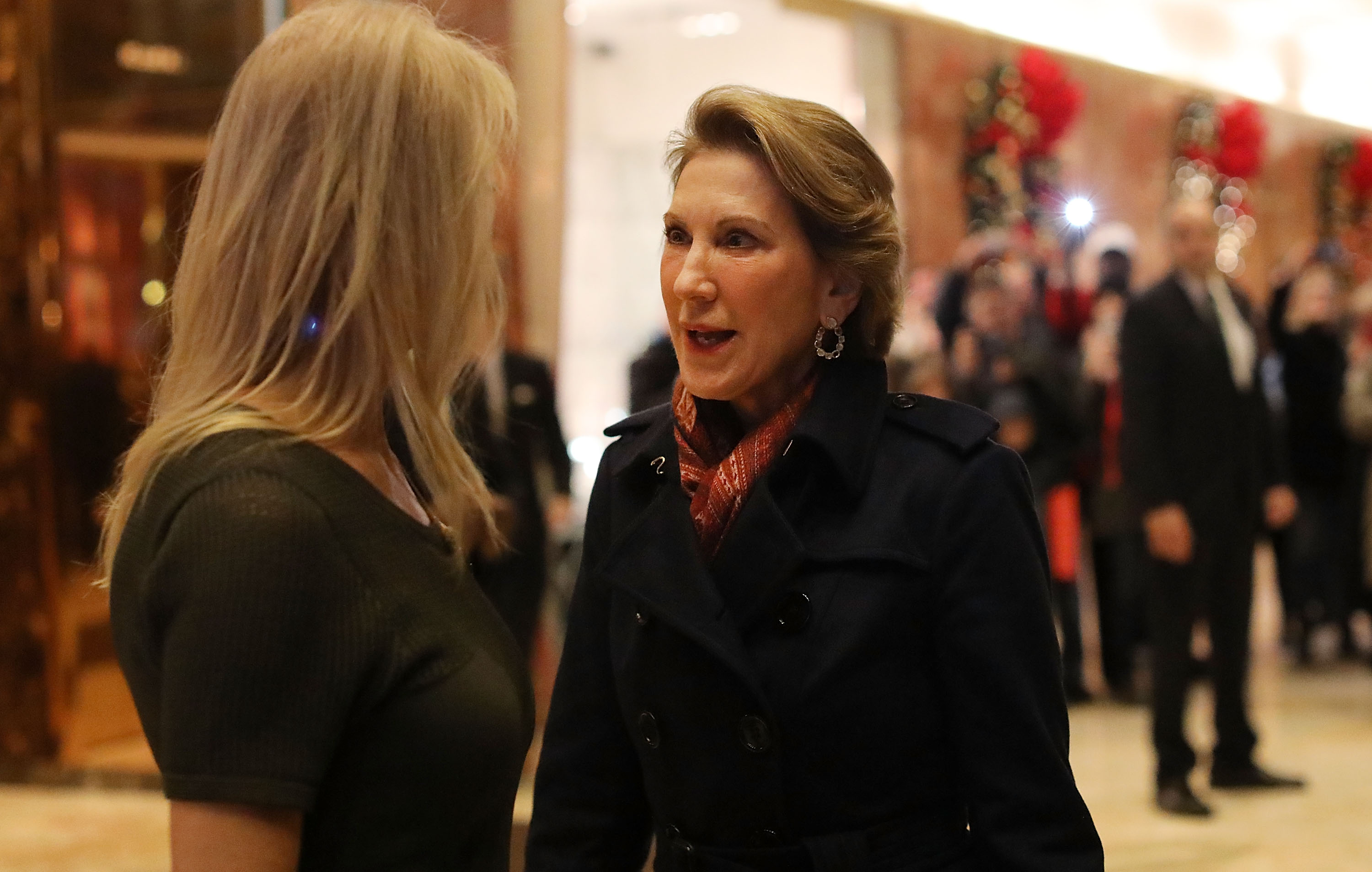 NEW YORK, NY - DECEMBER 12: Former Republican presidential candidate Carly Fiorina speaks to political strategist Kellyanne Conway after a meeting at Trump Tower on December 12, 2016 in New York City. President-elect Donald Trump continues to hold meetings with potential members of his cabinet at his office. (Photo by Spencer Platt/Getty Images)