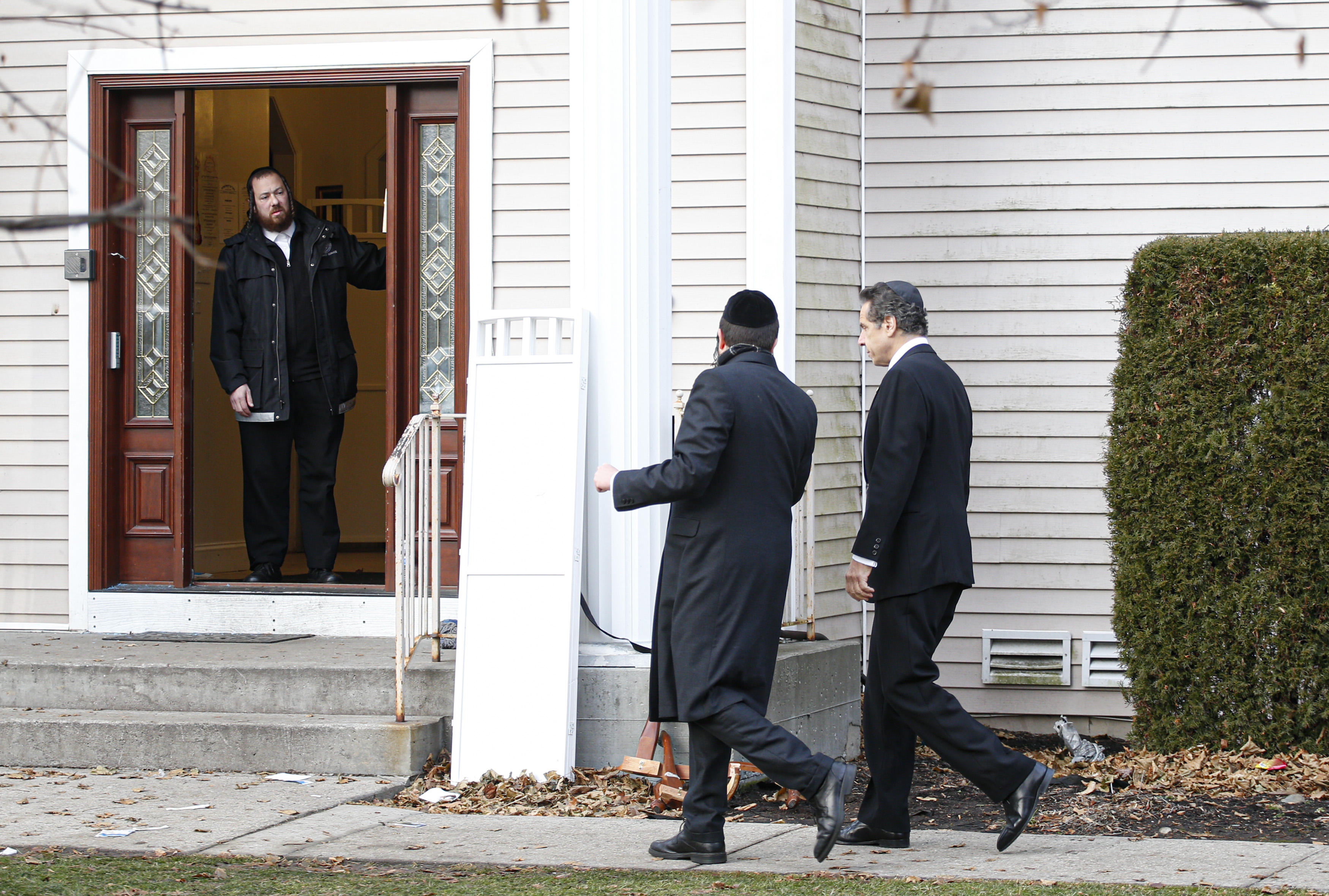 New York Governor Andrew Cuomo arrives to the home of rabbi, Chaim Rottenbergin Monsey, in New York on December 29, 2019 after a machete attack that took place earlier outside the rabbi's home during the Jewish festival of Hanukkah in Monsey, New York. - An intruder stabbed and wounded five people at a rabbi's house in New York during a gathering to celebrate the Jewish festival of Hanukkah late on December 28, 2019, officials and media reports said. Local police departments, speaking to AFP, declined to give the number of people injured, but a suspect has been taken into custody and a vehicle safeguarded, an NYPD spokesman said. (Photo by KENA BETANCUR/AFP via Getty Images)