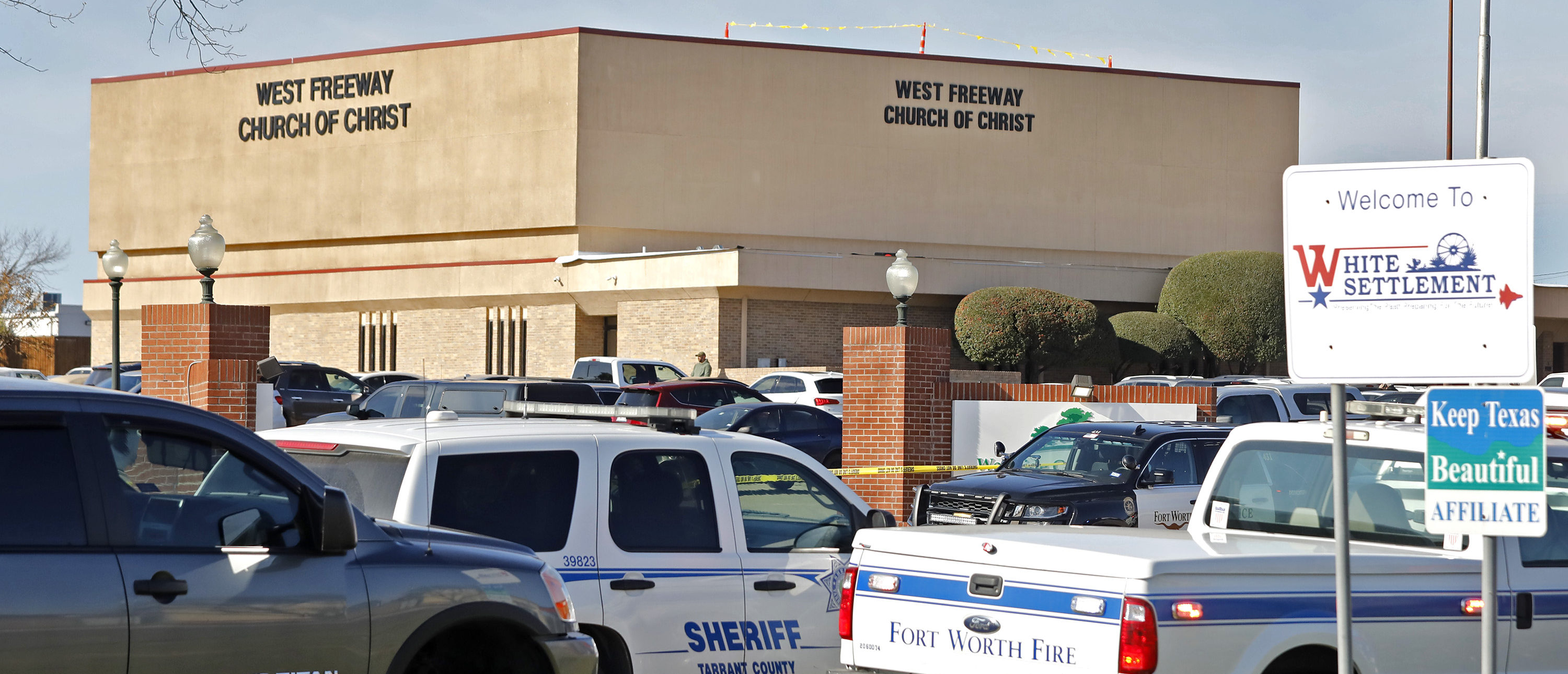 WHITE SETTLEMENT, TX - DECEMBER 29: Law enforcement vehicles are parked outside West Freeway Church of Christ where a shooting took place at the morning service on December 29, 2019 in White Settlement, Texas. The gunman was killed by armed members of the church after he opened fire during Sunday services. According to reports, a security guard was killed by the gunman. (Photo by Stewart F. House/Getty Images)