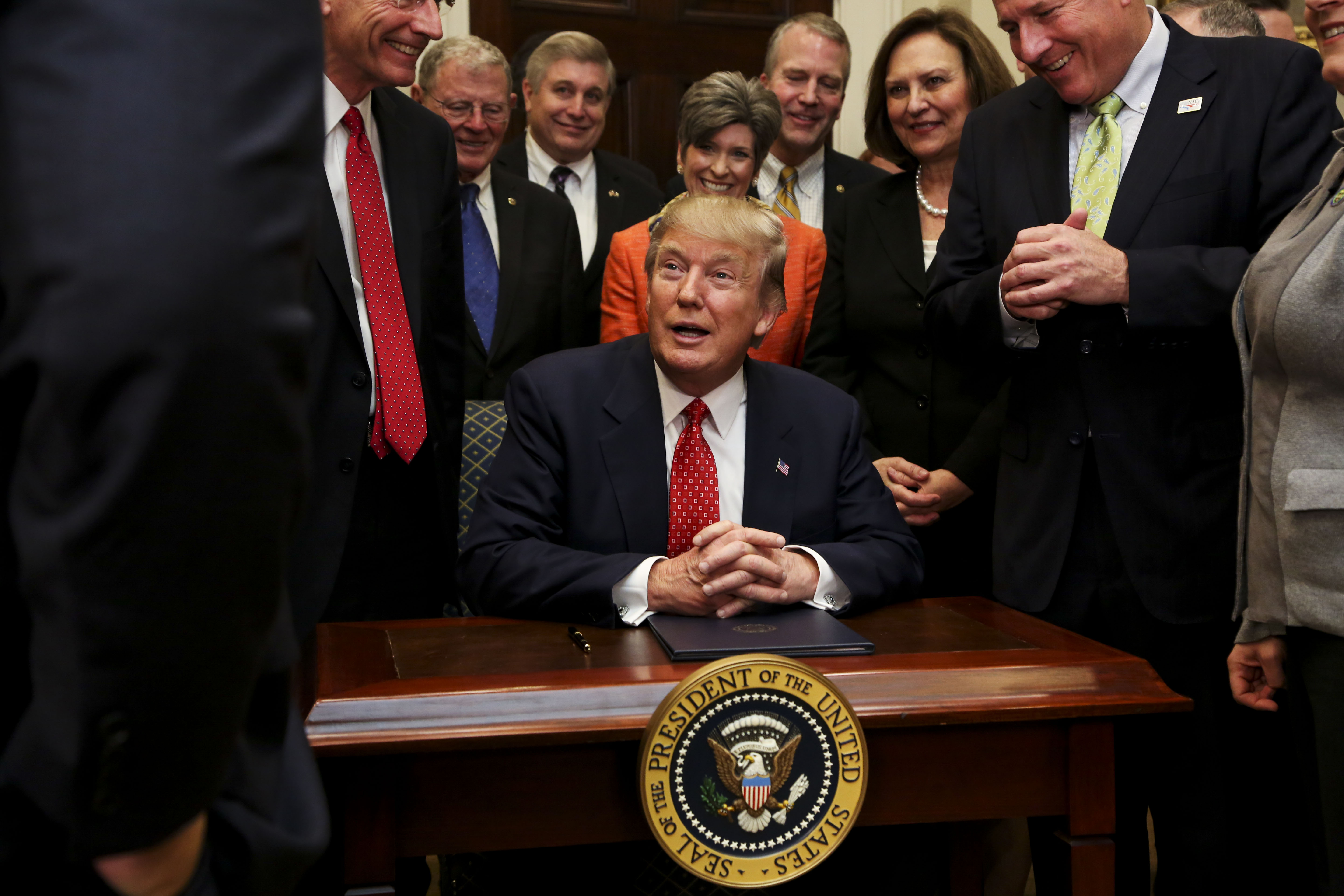 WASHINGTON, D.C. - FEBRUARY 28: President Donald Trump speaks before signing an Executive Order to begin the roll-back of environmental regulations put in place by the Obama administration February 28, 2017 in the Roosevelt Room of the White House in Washington, D.C. The Clean Water Rule, also known as WOTUS, the Waters of the U.S. rule, has been unpopular with some farmers, housing developers and energy companies. (Photo by Aude Guerrucci-Pool/Getty Images)