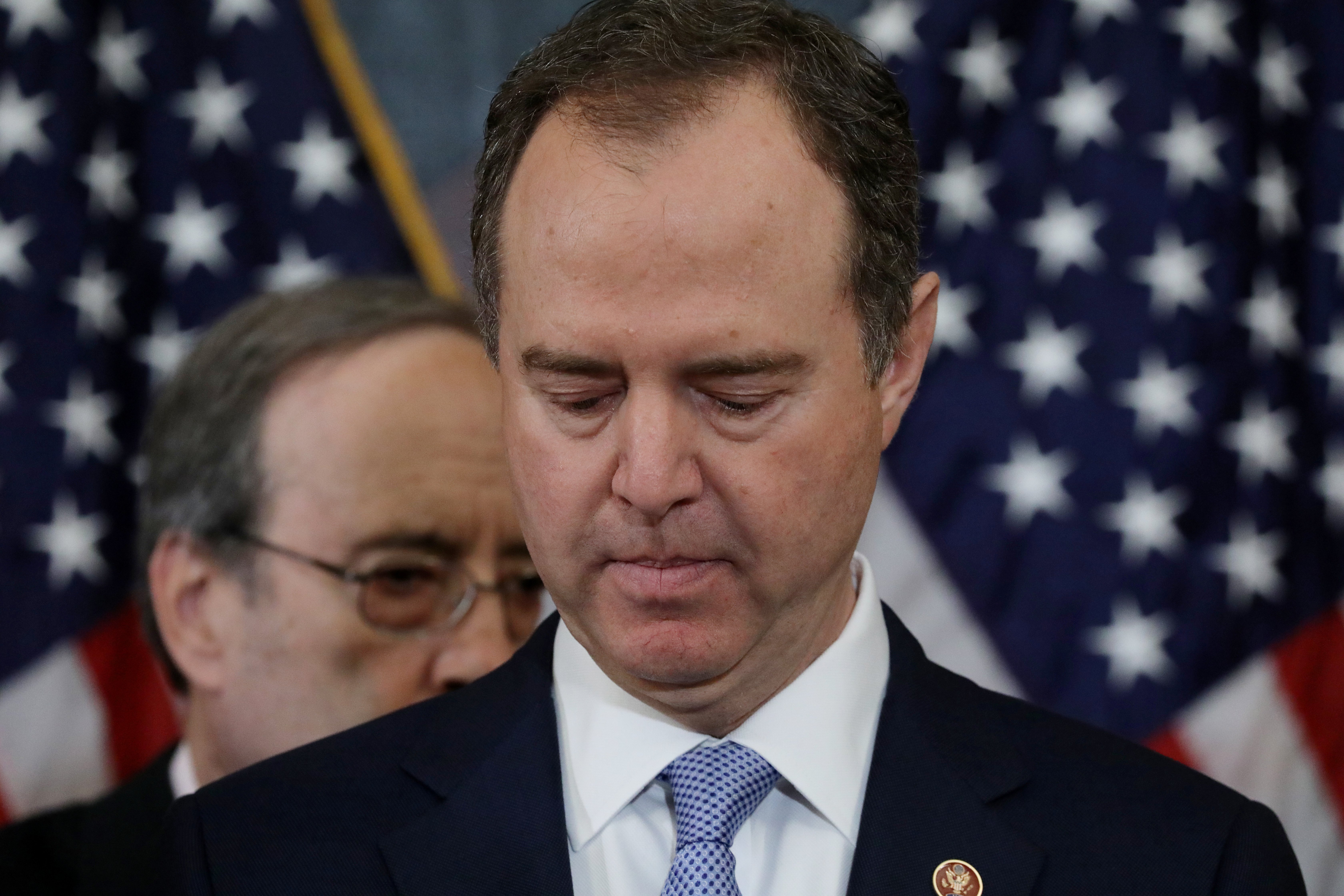 House Intelligence Chairman Adam Schiff (D-CA) pauses while speaking to reporters with House Foreign Affairs Chairman Eliot Engel (D-NY) and other House committee chairs during a news conference to announce articles of impeachment against U.S. President Donald Trump on Capitol Hill in Washington, U.S., Dec. 10, 2019. REUTERS/Jonathan Ernst 