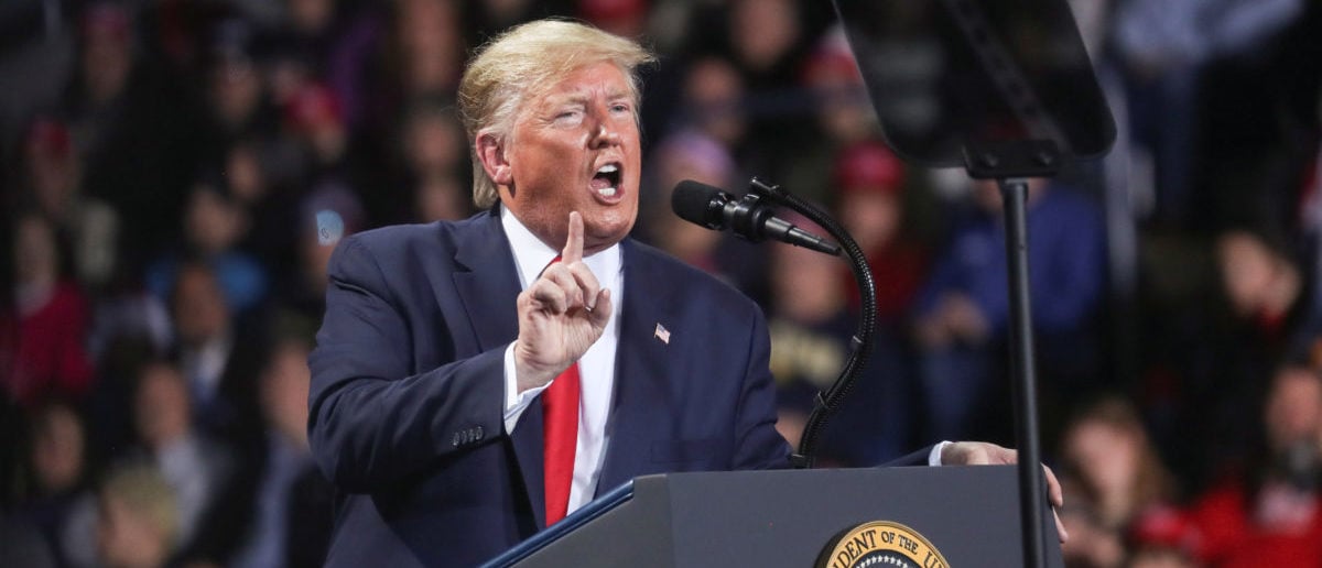 FILE PHOTO: U.S. President Donald Trump reacts while speaking during a campaign rally in Battle Creek, Michigan, U.S., December 18, 2019. REUTERS/Leah Millis?/File Photo