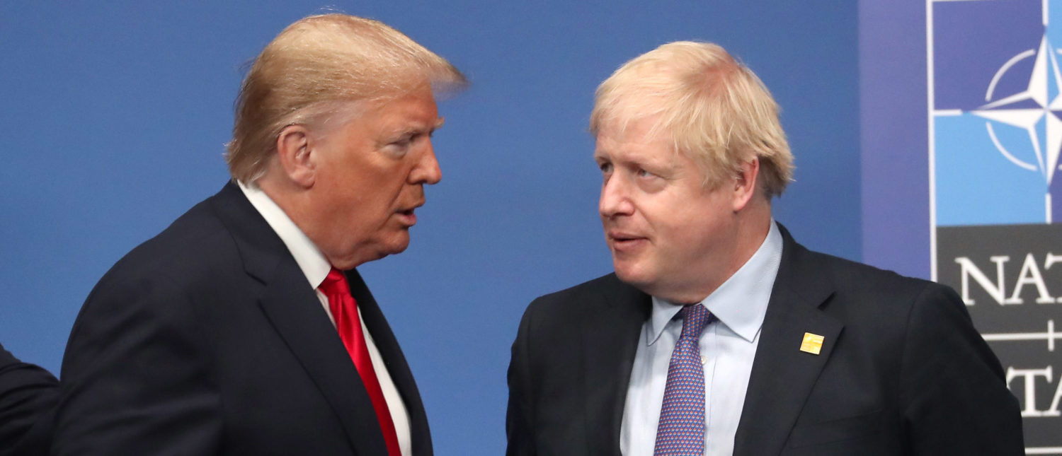 HERTFORD, ENGLAND - DECEMBER 04: US President Donald Trump and British Prime Minister Boris Johnson onstage during the annual NATO heads of government summit on December 4, 2019 in Watford, England. France and the UK signed the Treaty of Dunkirk in 1947 in the aftermath of WW2 cementing a mutual alliance in the event of an attack by Germany or the Soviet Union. The Benelux countries joined the Treaty and in April 1949 expanded further to include North America and Canada followed by Portugal, Italy, Norway, Denmark and Iceland. This new military alliance became the North Atlantic Treaty Organisation (NATO). The organisation grew with Greece and Turkey becoming members and a re-armed West Germany was permitted in 1955. This encouraged the creation of the Soviet-led Warsaw Pact delineating the two sides of the Cold War. This year marks the 70th anniversary of NATO. (Photo by Steve Parsons-WPA Pool/Getty Images)
