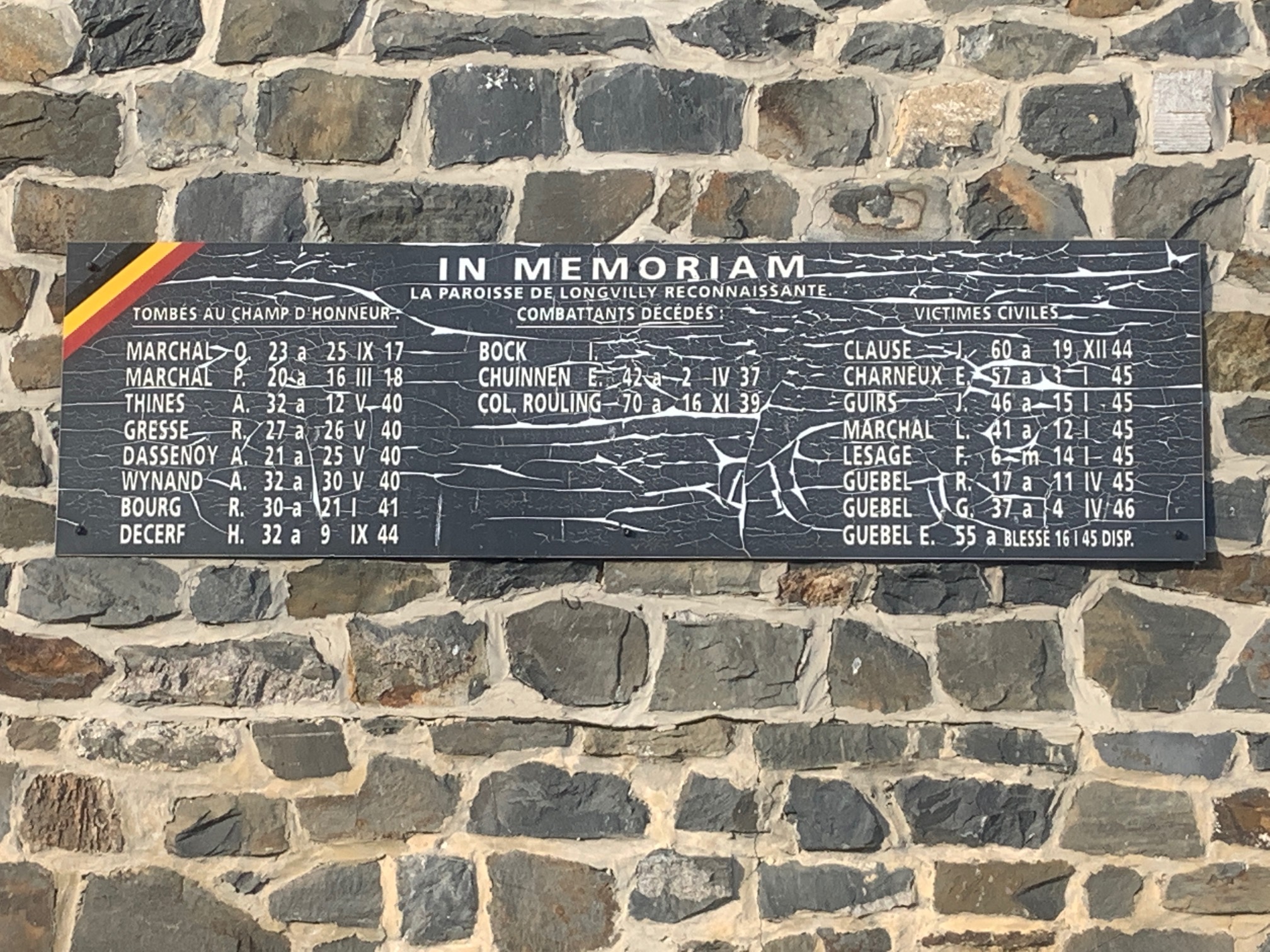 A plaque on the side of Longvilly's church honors the military and civilian casualties of the Battle of the Bulge. Virginia Kruta/The Daily Caller