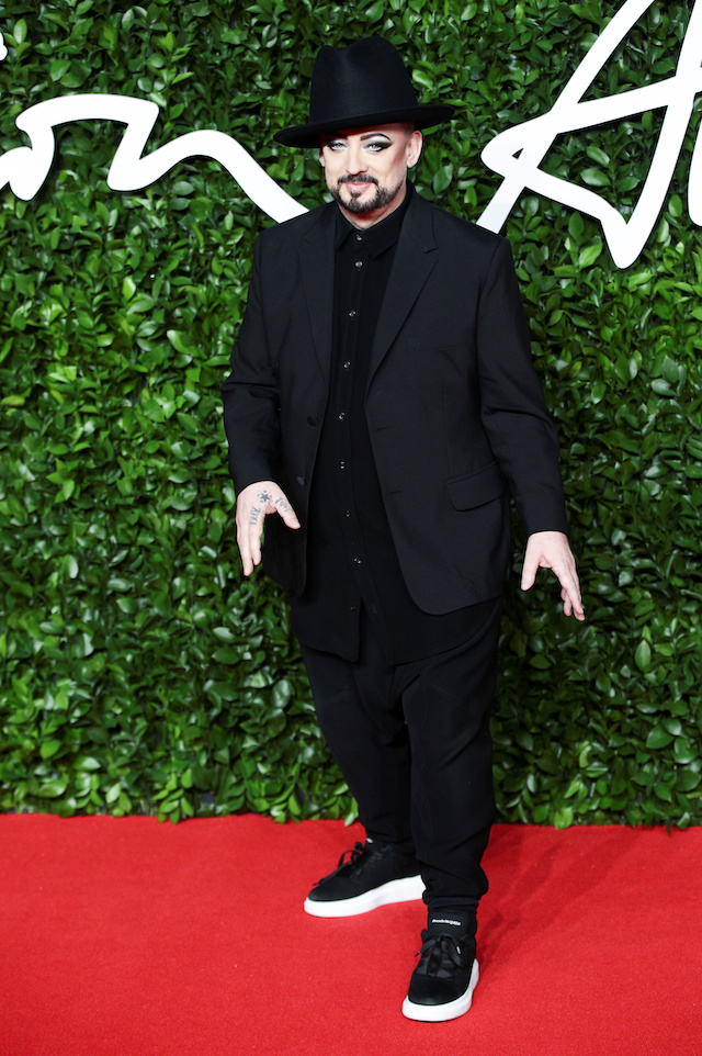 Singer Boy George poses as he arrives at the Fashion Awards 2019 in London, Britain December 2, 2019. REUTERS/Lisi Niesner 