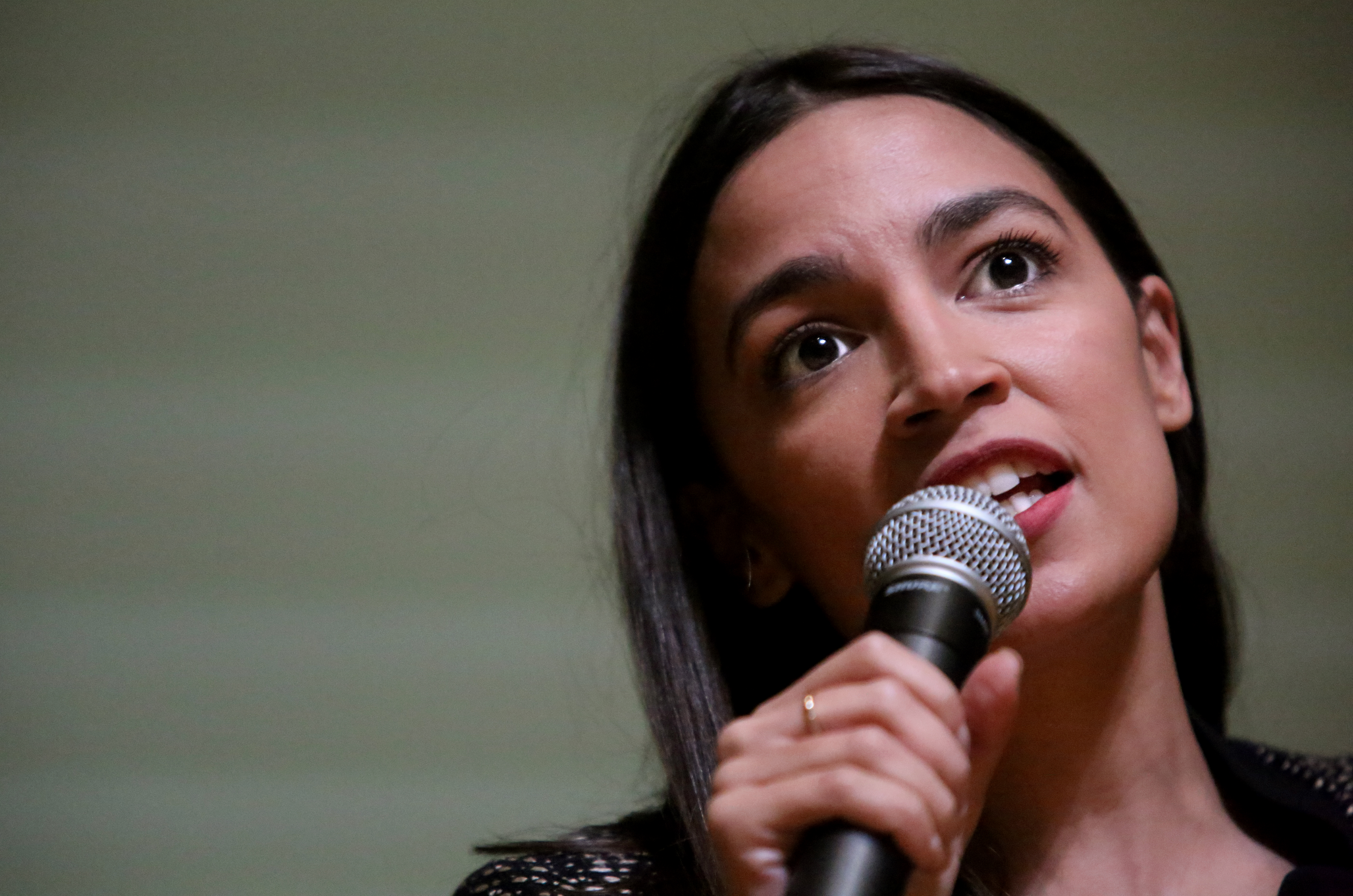 NEW YORK, NY - DECEMBER 14: Rep. Alexandria Ocasio-Cortez (D-NY) speaks during a Green New Deal For Public Housing Town Hall on December 14, 2019 in the Queens borough of New York City. (Photo by Yana Paskova/Getty Images)