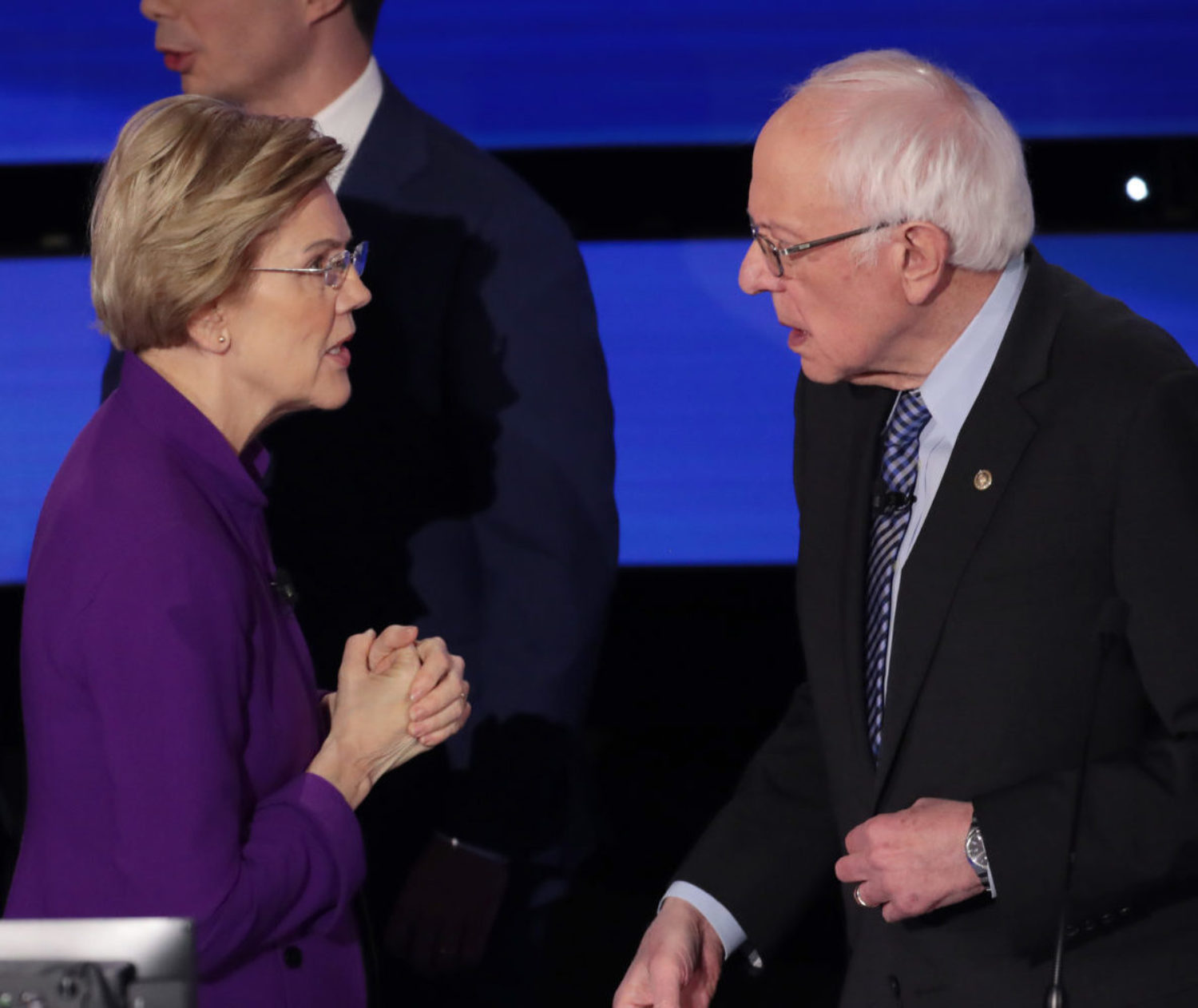 DES MOINES, IOWA - JANUARY 14: Sen. Elizabeth Warren (D-MA) and Sen. Bernie Sanders (I-VT) speak after the Democratic presidential primary debate at Drake University on January 14, 2020 in Des Moines, Iowa. Six candidates out of the field qualified for the first Democratic presidential primary debate of 2020, hosted by CNN and the Des Moines Register. (Photo by Scott Olson/Getty Images)