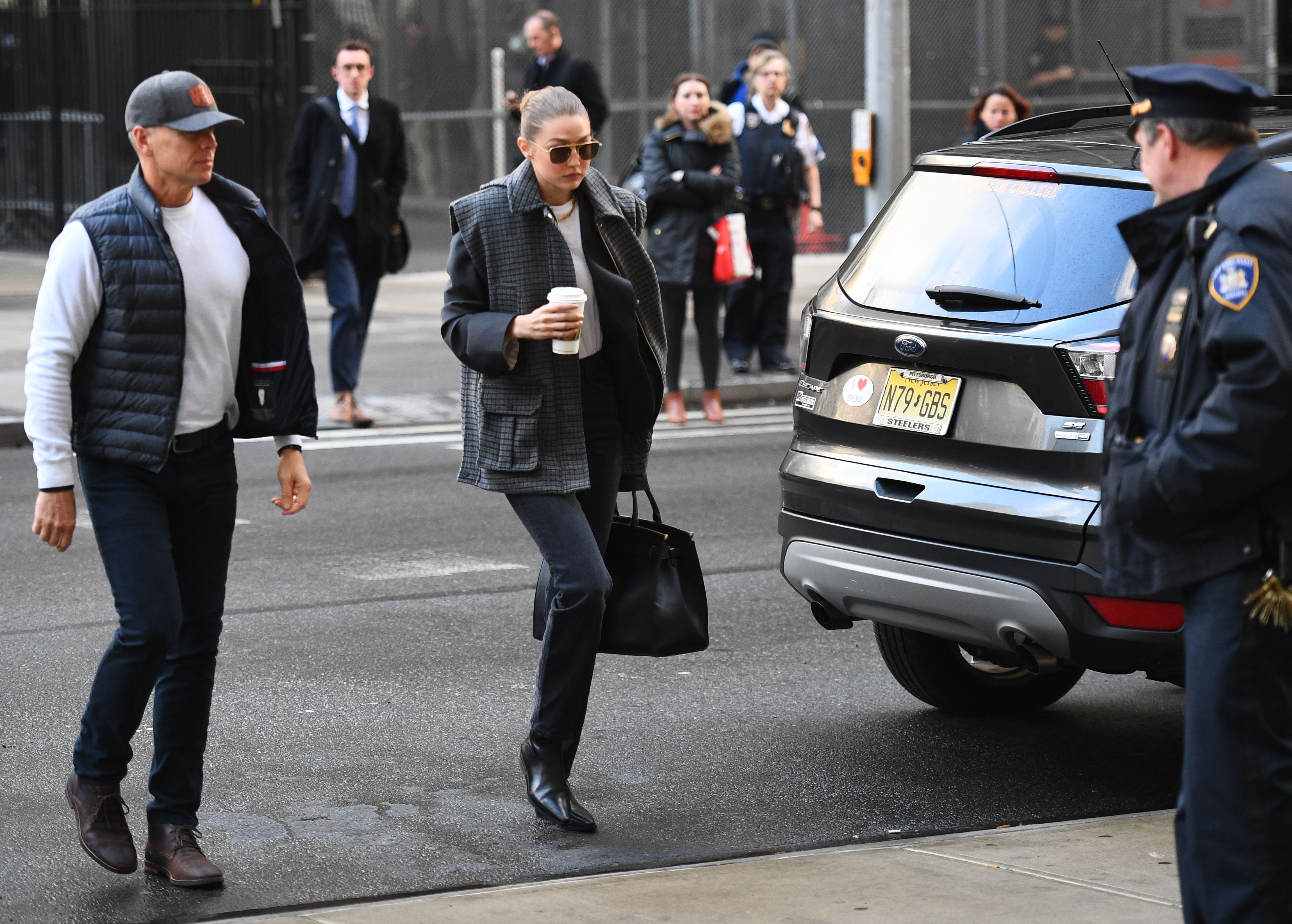 Model Gigi Hadid arrives at Manhattan Criminal Court, on January 16, 2020, in New York City. - Hadid has been called as a potential juror in disgraced movie producer Harvey Weinstein's rape and sexual assault trial, adding a fresh celebrity twist to the high-profile proceedings. (Photo by JOHANNES EISELE/AFP via Getty Images)