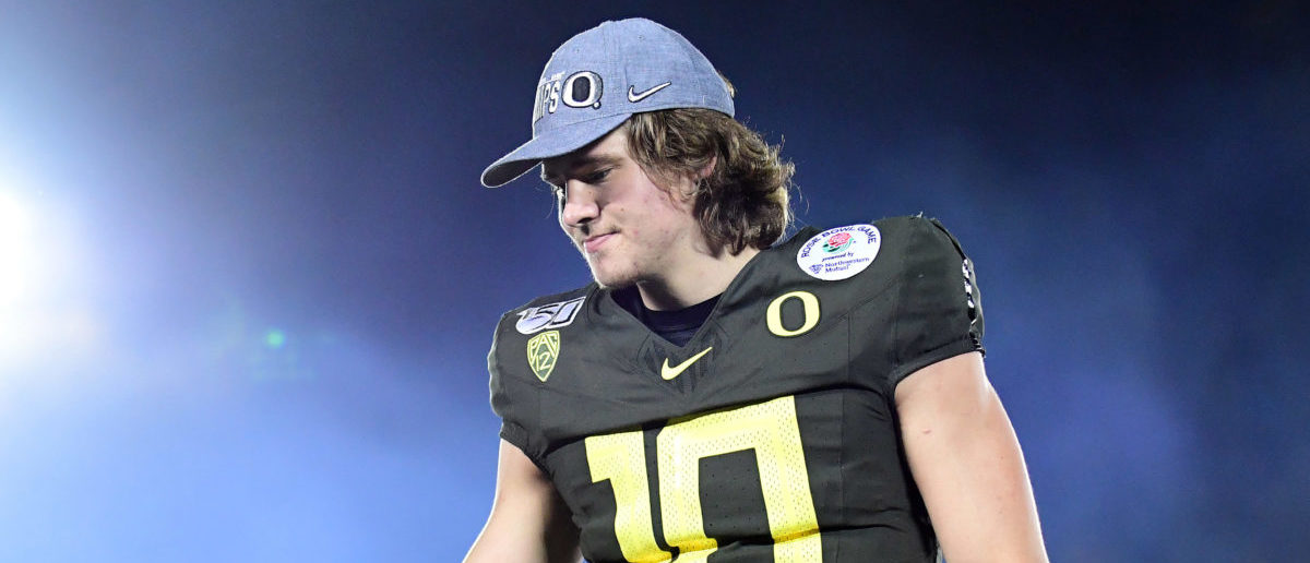 A shirtless Justin Herbert? Oregon Ducks say their QB's come out of his  shell in other ways 