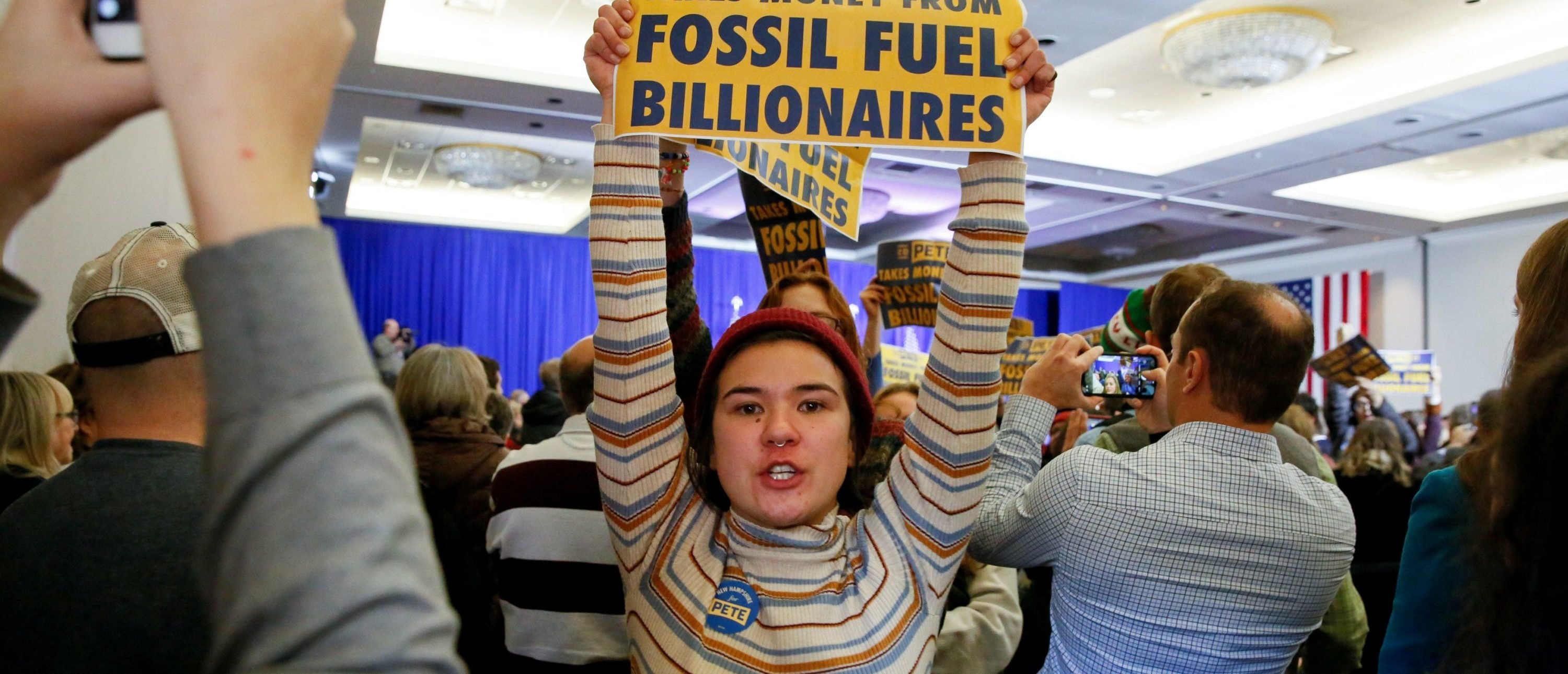 Climate change activists disrupt a campaign town hall meeting with Democratic 2020 U.S. presidential candidate and former South Bend Mayor Pete Buttigieg in Concord, New Hampshire, U.S., Jan. 17, 2020. REUTERS/Elizabeth Frantz