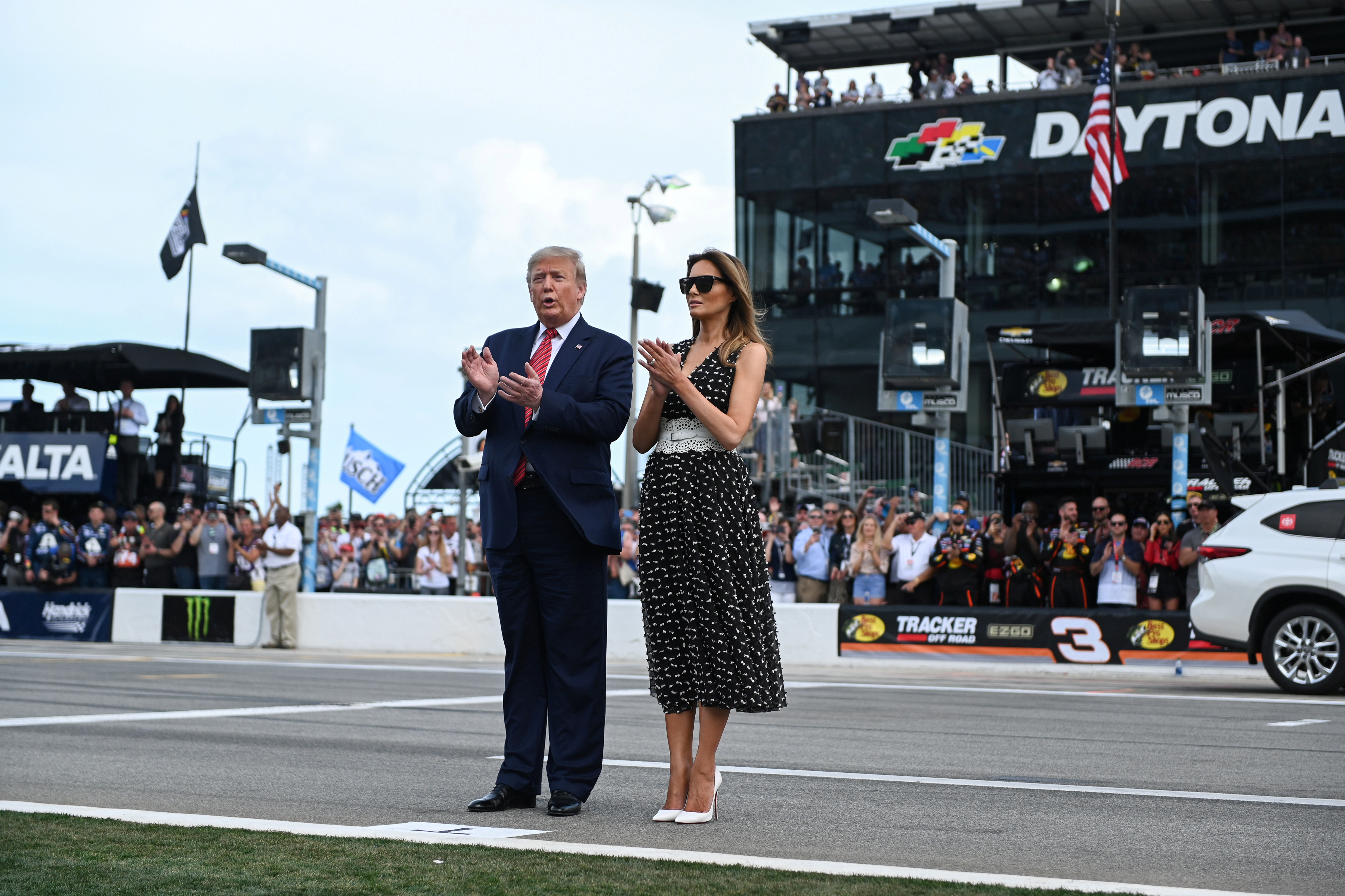 U.S. President Donald Trump and first lady Melania Trump arrive at the NASCAR Daytona 500 in Daytona Beach, Florida, U.S., Feb. 16, 2020. REUTERS/Erin Scott -