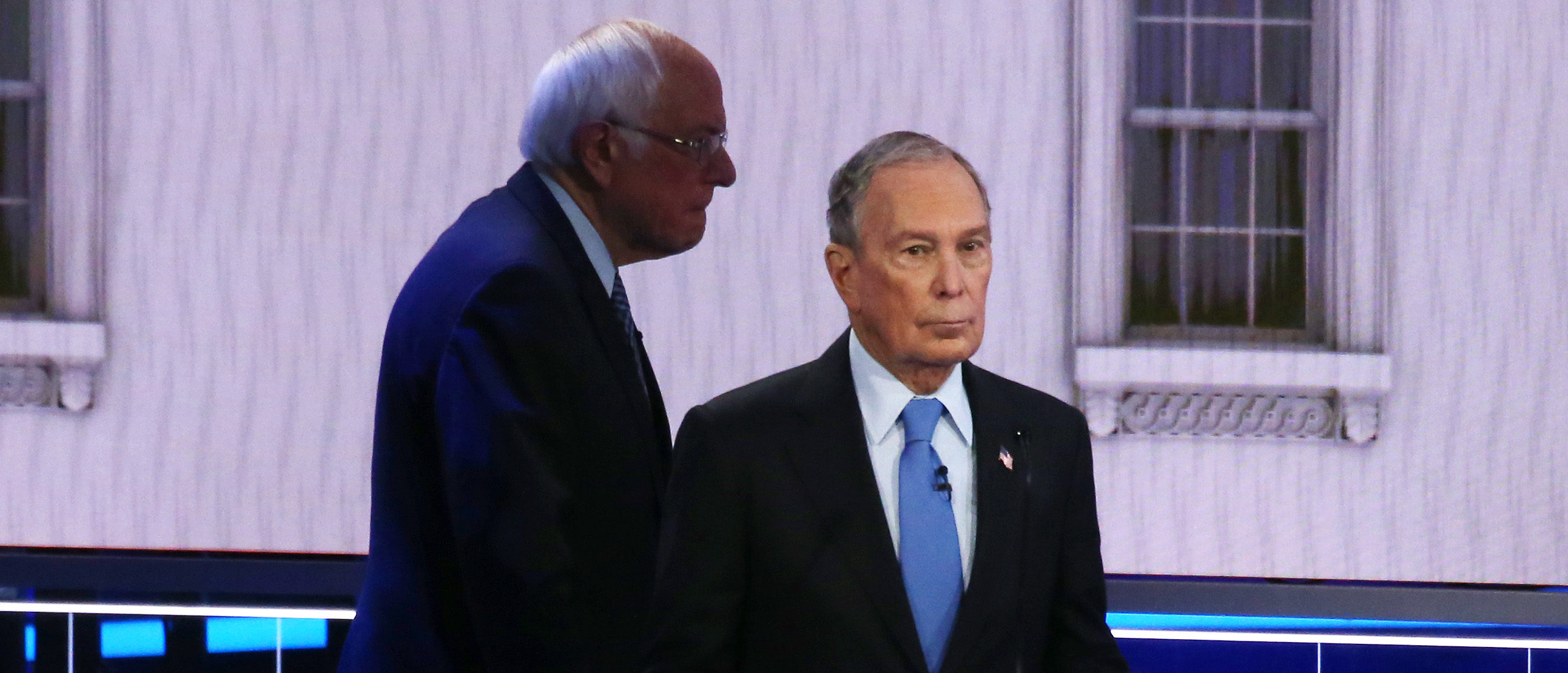 LAS VEGAS, NEVADA - FEBRUARY 19: Democratic presidential candidates Sen. Bernie Sanders (I-VT) (L) and former New York City mayor Mike Bloomberg take a break during the Democratic presidential primary debate at Paris Las Vegas on February 19, 2020 in Las Vegas, Nevada. Six candidates qualified for the third Democratic presidential primary debate of 2020, which comes just days before the Nevada caucuses on February 22. (Photo by Mario Tama/Getty Images)