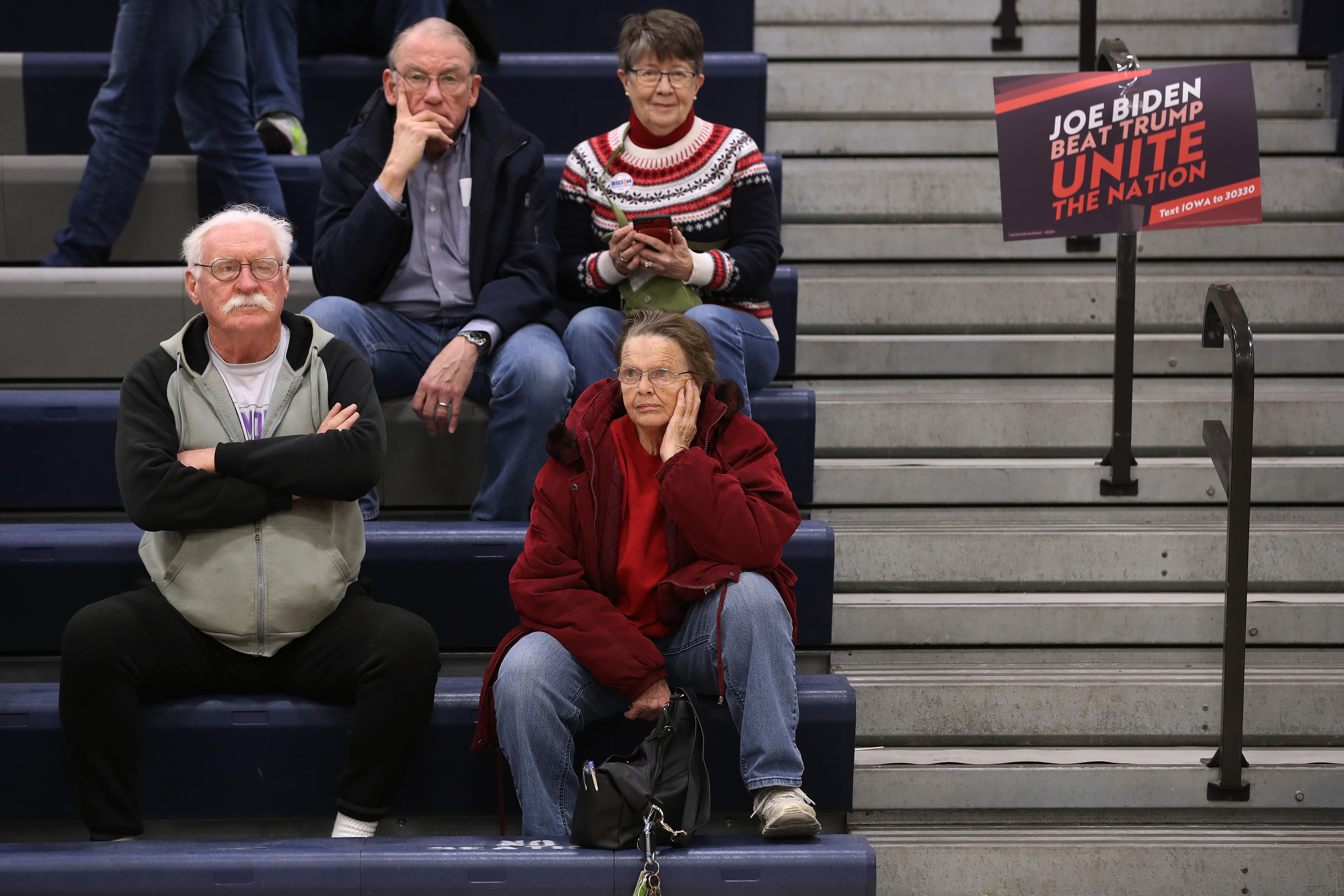 DES MOINES, IOWA - FEBRUARY 03: Supporters of Democratic presidential candidate former Vice President Joe Biden prepare to caucus for him in the gymnasium at Roosevelt High School February 03, 2020 in Des Moines, Iowa. Iowa is the first contest in the 2020 presidential nominating process with the candidates then moving on to New Hampshire. (Photo by Chip Somodevilla/Getty Images)