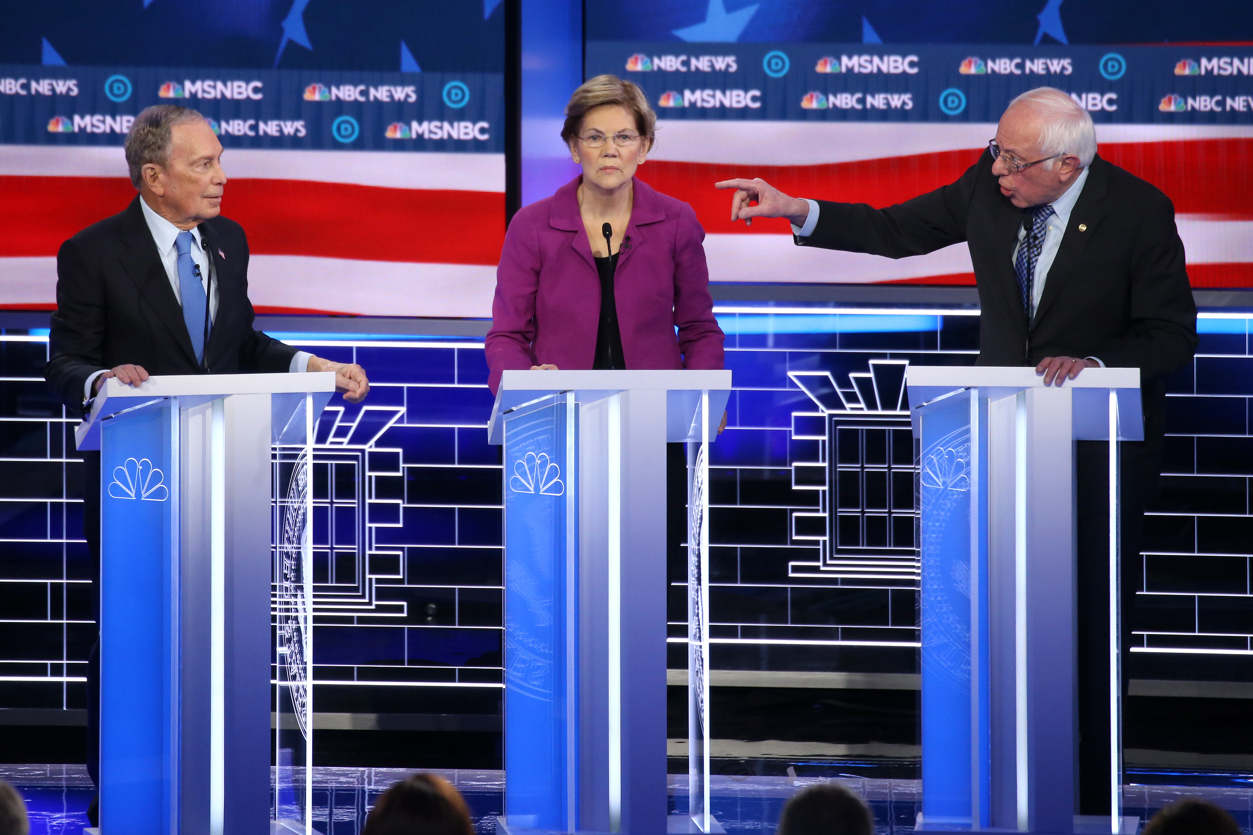 LAS VEGAS, NEVADA - FEBRUARY 19: Democratic presidential candidate Sen. Bernie Sanders (I-VT) (R) gestures as Sen. Elizabeth Warren (D-MA) and former New York City mayor Mike Bloomberg listen during the Democratic presidential primary debate at Paris Las Vegas on February 19, 2020 in Las Vegas, Nevada. Six candidates qualified for the third Democratic presidential primary debate of 2020, which comes just days before the Nevada caucuses on February 22. (Photo by Mario Tama/Getty Images)
