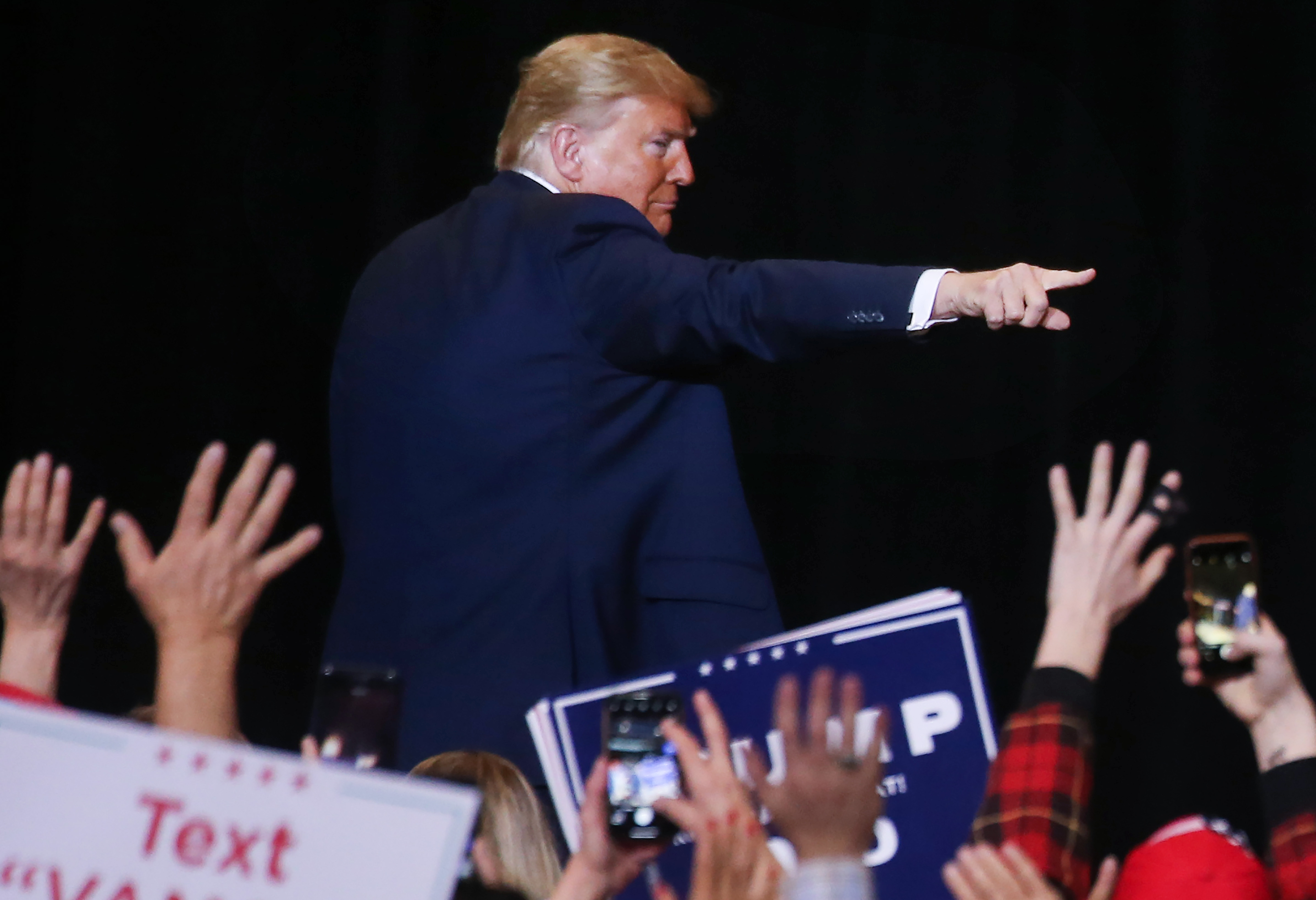 LAS VEGAS, NEVADA - FEBRUARY 21: President Donald Trump points to the crowd as he departs a campaign rally at Las Vegas Convention Center on February 21, 2020 in Las Vegas, Nevada. The upcoming Nevada Democratic presidential caucus will be held February 22. (Photo by Mario Tama/Getty Images)