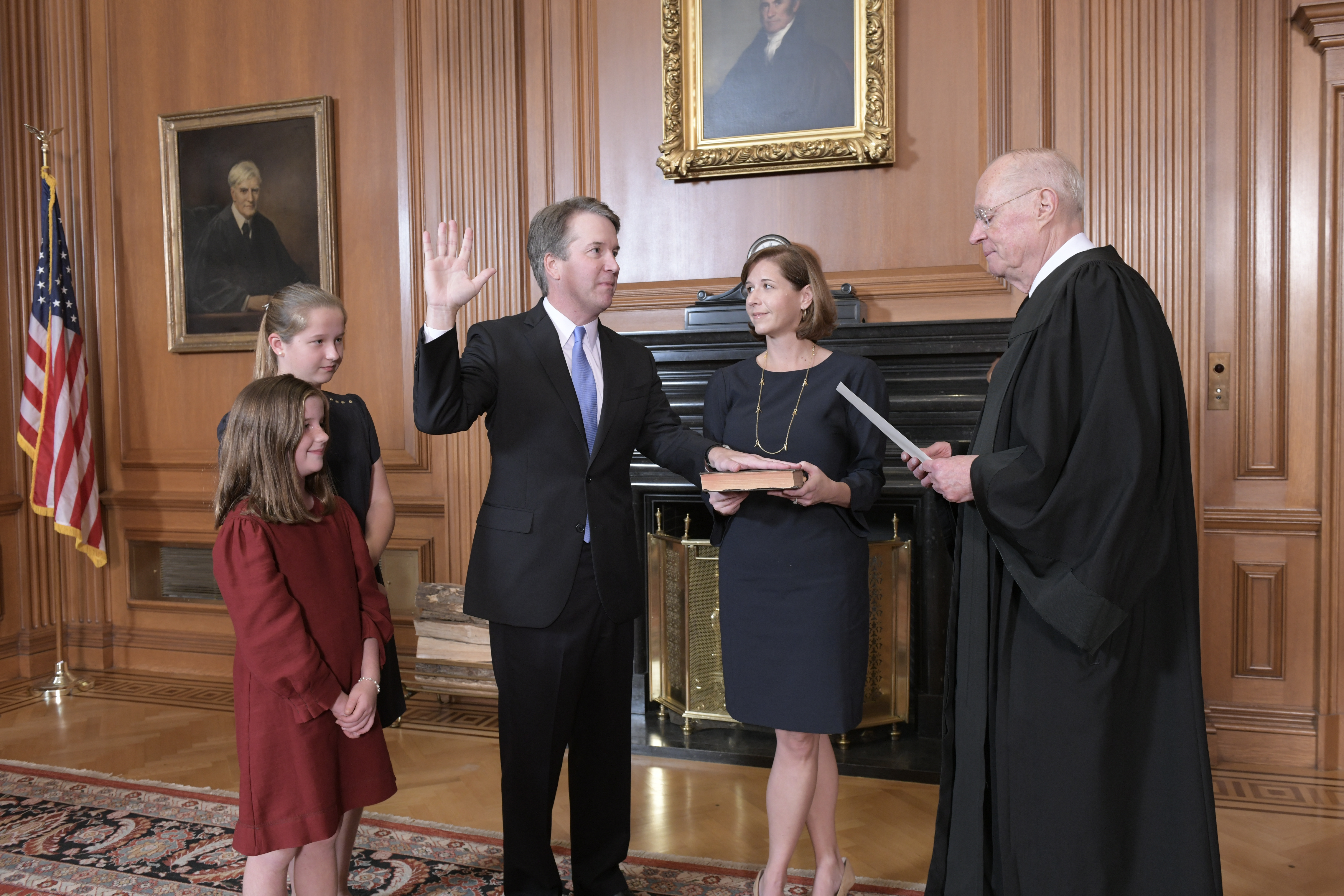 WASHINGTON, DC - OCTOBER 6: In this handout photo provided by the Supreme Court of the United States, Justice Anthony M. Kennedy, (Retired) administers the Judicial Oath to Judge Brett M. Kavanaugh as his wife Ashley Kavanaugh holds the Bible while joined by their daughters Margaret and Liza, in the Justices Conference Room at the Supreme Court Building on October 6, 2018 in Washington, DC. (Photo by Fred Schilling/Supreme Court of the United States via Getty Images)