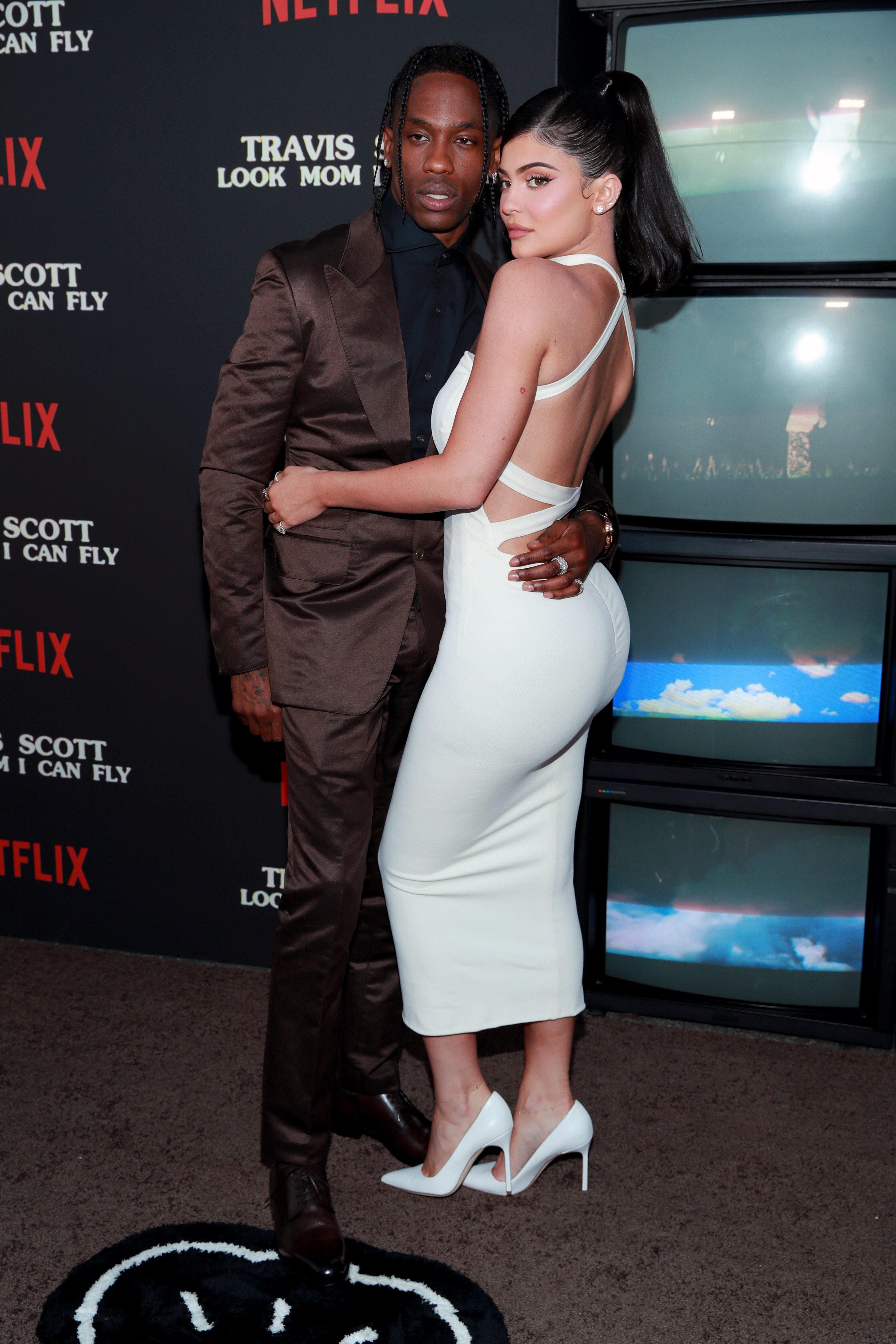 SANTA MONICA, CALIFORNIA - AUGUST 27: (L-R) Travis Scott and Kylie Jenner attend the premiere of Netflix's "Travis Scott: Look Mom I Can Fly" at Barker Hangar on August 27, 2019 in Santa Monica, California. (Photo by Rich Fury/Getty Images)