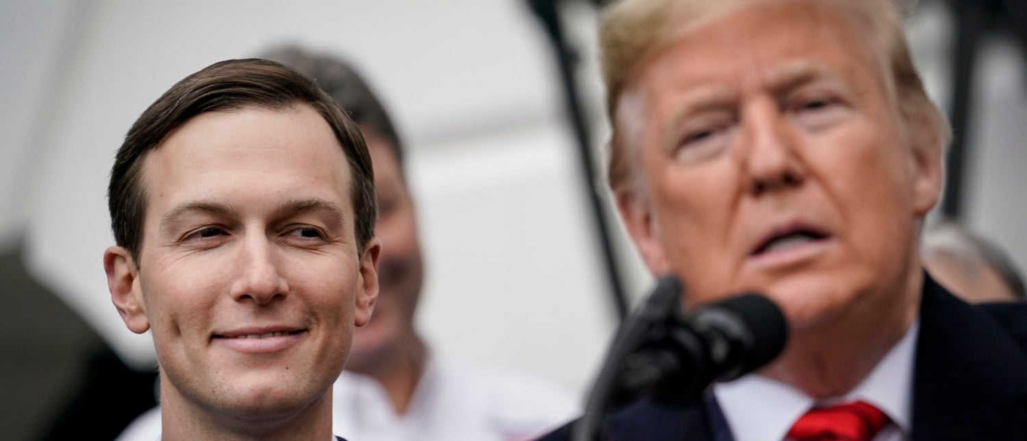 WASHINGTON, DC - JANUARY 29: (L-R) Senior Advisor Jared Kushner looks on as U.S. President Donald Trump speaks before signing the United States-Mexico-Canada Trade Agreement (USMCA) during a ceremony on the South Lawn of the White House on January 29, 2020 in Washington, DC. The new U.S.-Mexico-Canada Agreement (USMCA) will replace the 25-year-old North American Free Trade Agreement (NAFTA) with provisions aimed at strengthening the U.S. auto manufacturing industry, improving labor standards enforcement and increasing market access for American dairy farmers. The USMCA signing is considered one of President Trump's biggest legislative achievements since Democrats took control of the House in 2018. (Photo by Drew Angerer/Getty Images)