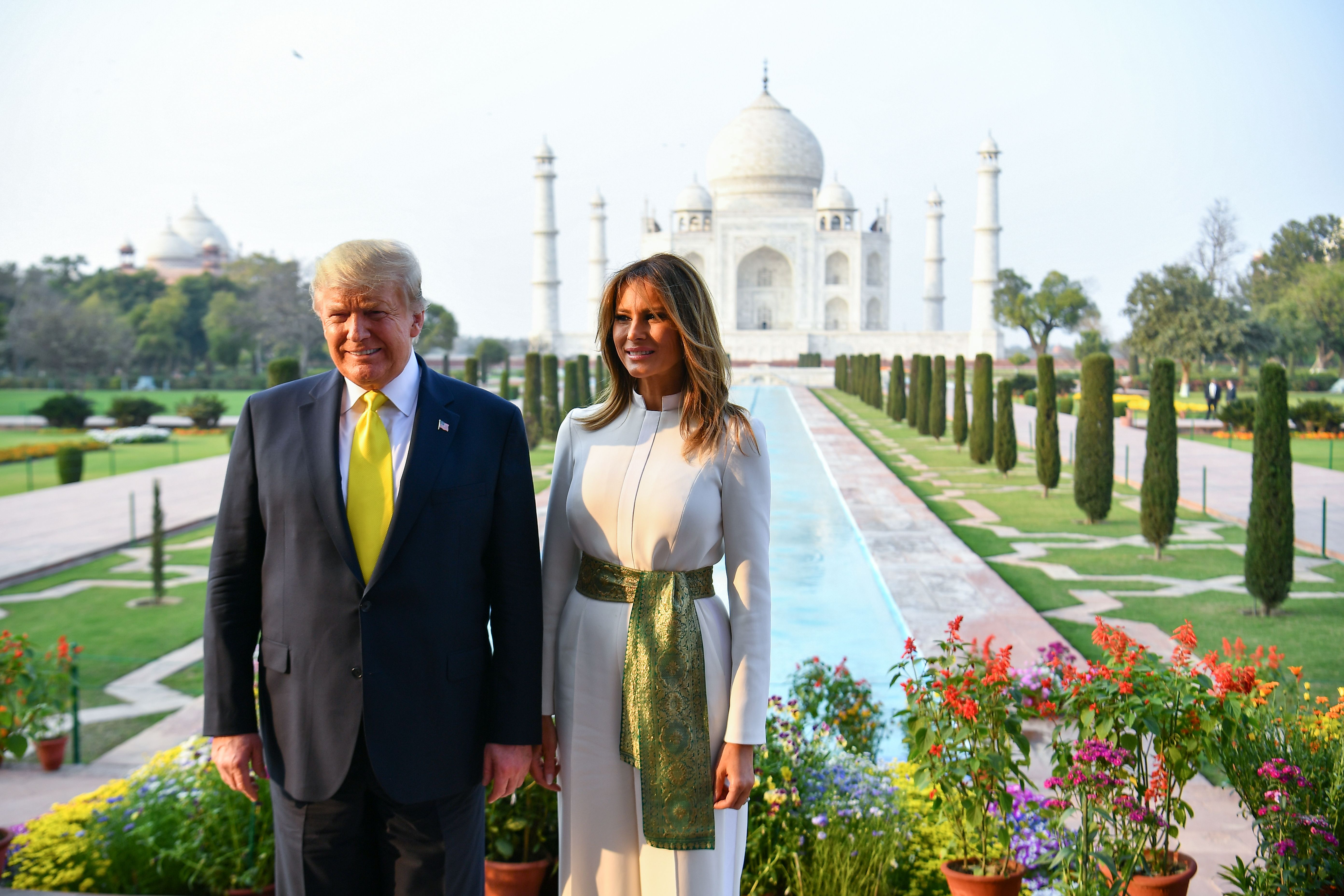 US President Donald Trump and First Lady Melania Trump pose as they visit the Taj Mahal in Agra on February 24, 2020. (MANDEL NGAN/AFP via Getty Images)